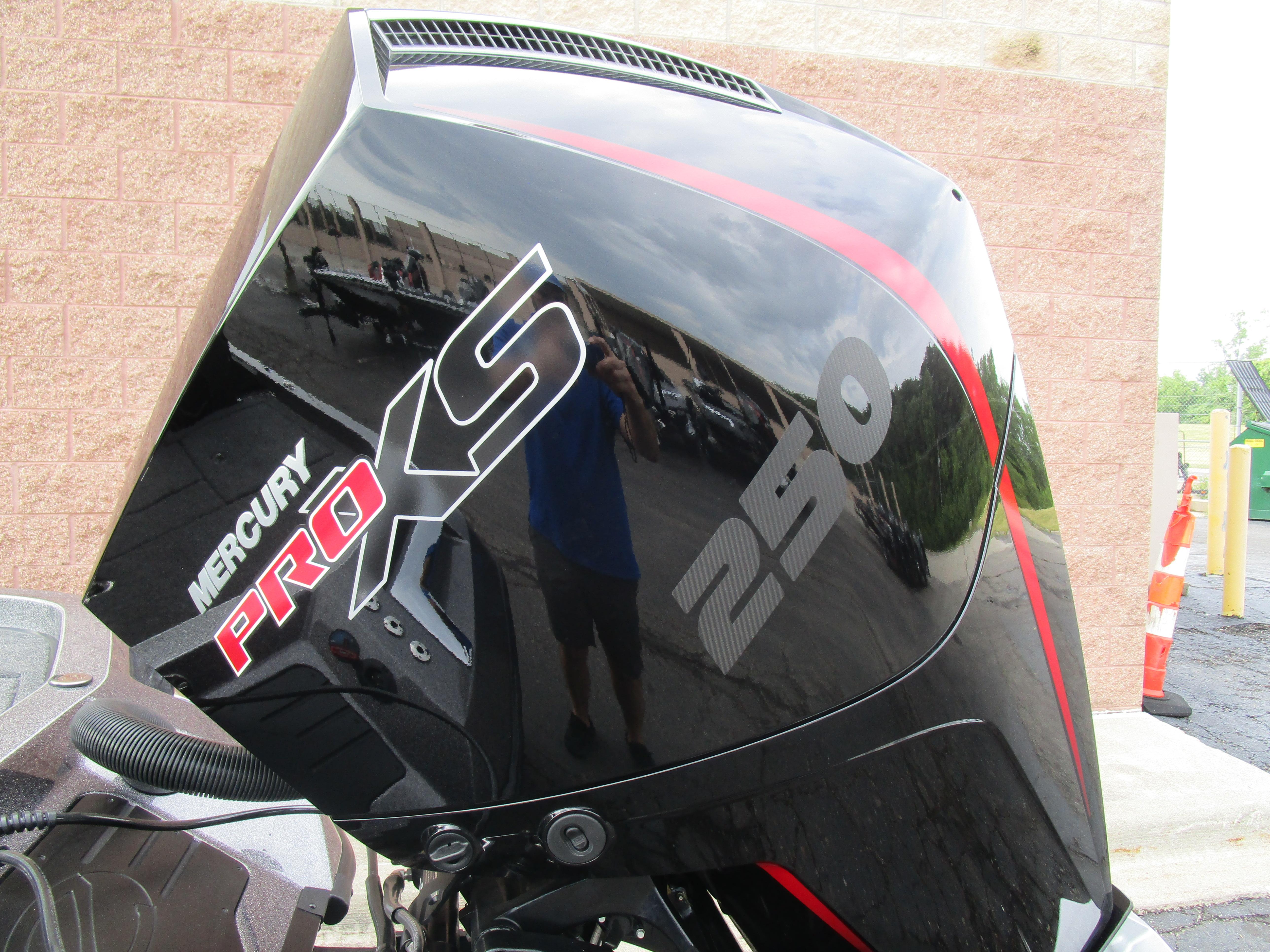Mercury Pro XS 250 engine on a 2025 Ranger Z520 boat, reflecting surroundings.