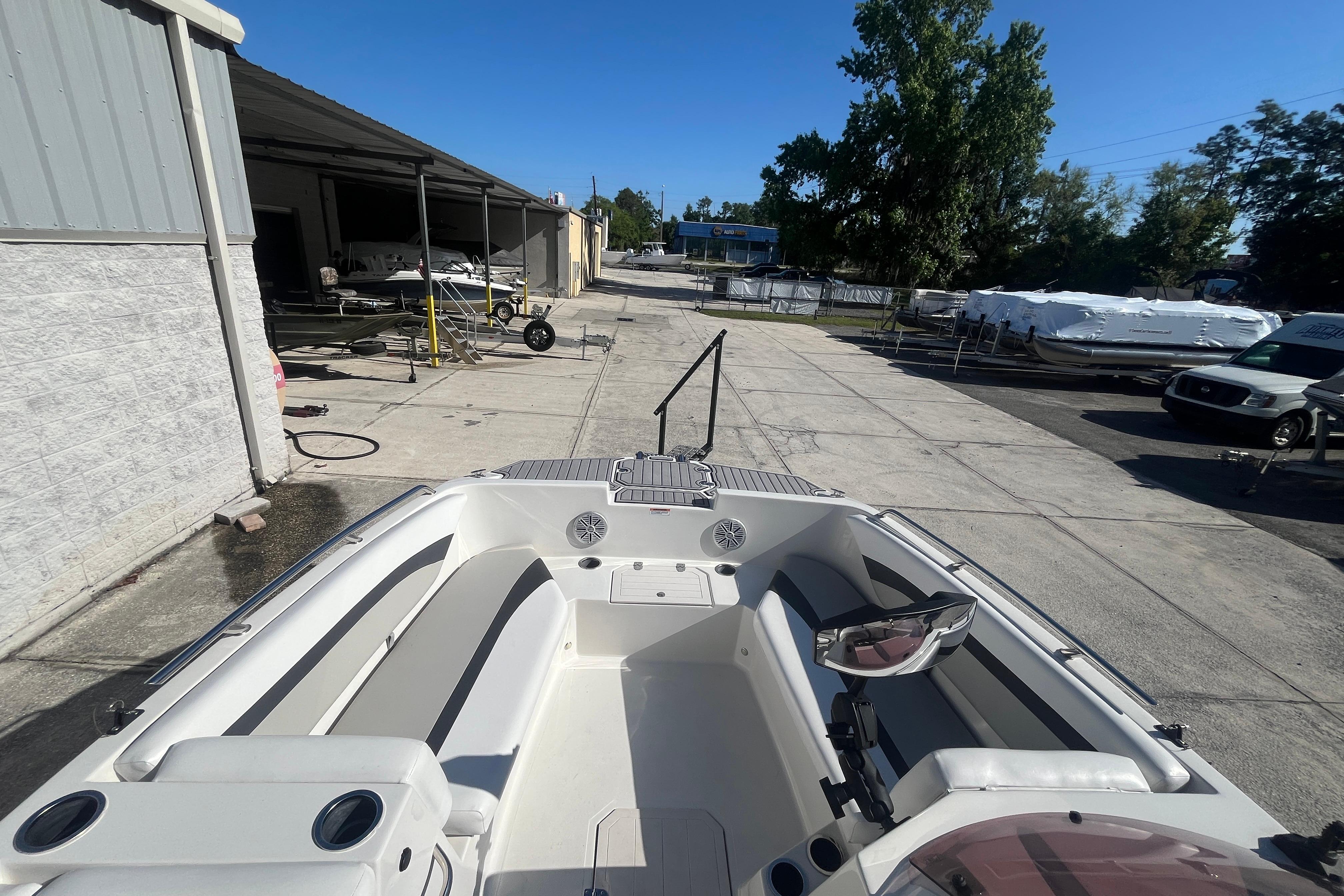 2025 Starcraft SVX 171 OB boat interior at a marina under clear blue sky.