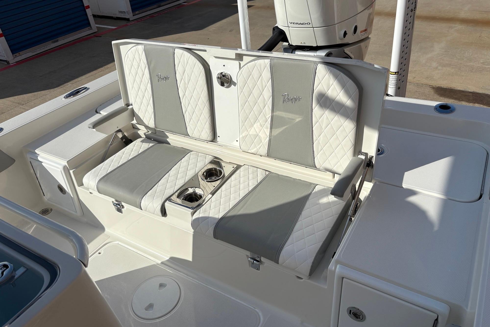 2026 Ranger 2510 Bay boat seating with cup holders and quilted upholstery.