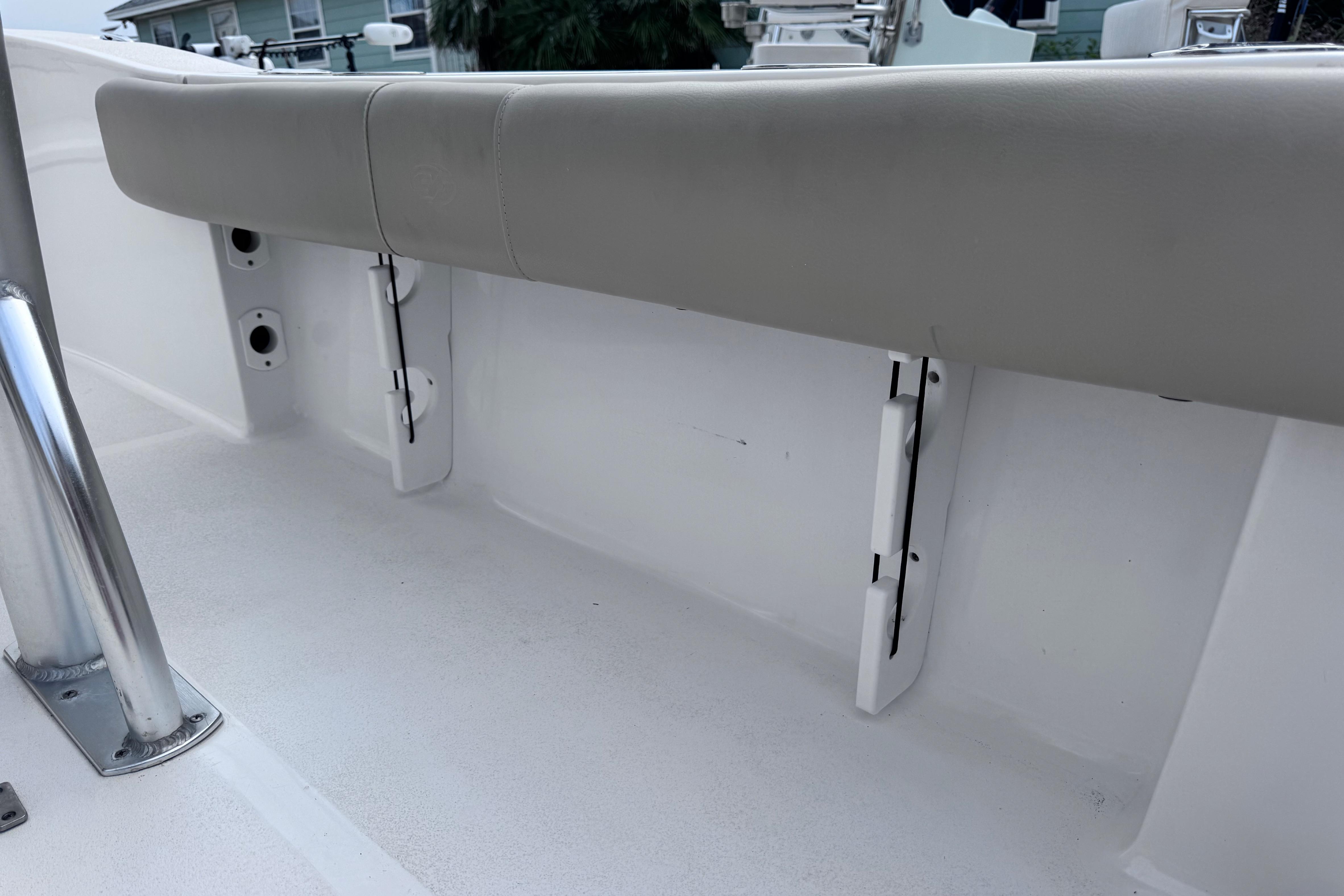 2018 Sea Fox 206 Commander boat interior with cushioned seating and rod holders.