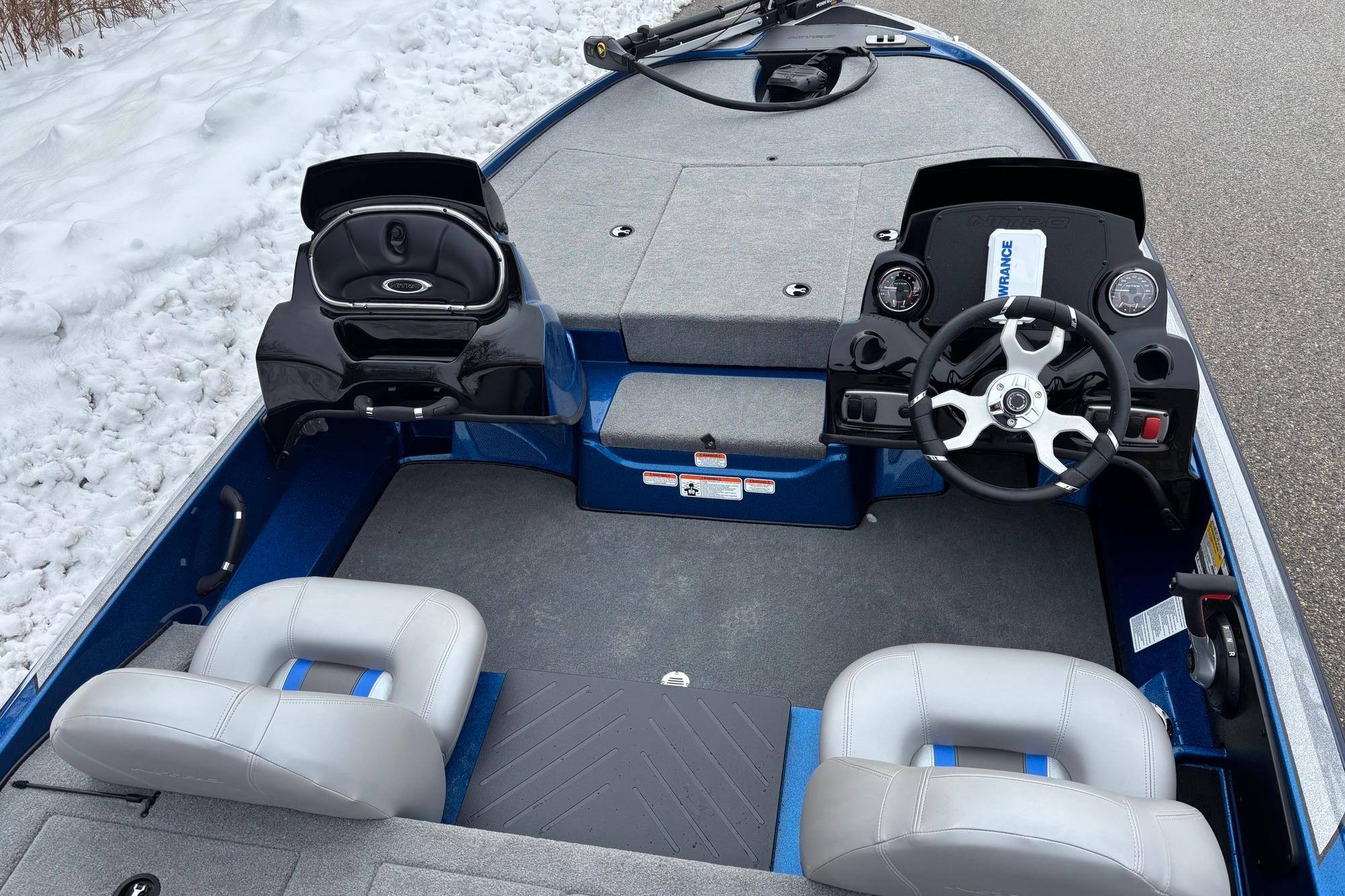 Interior of 2026 Nitro Z17 boat with dual seats and steering console.
