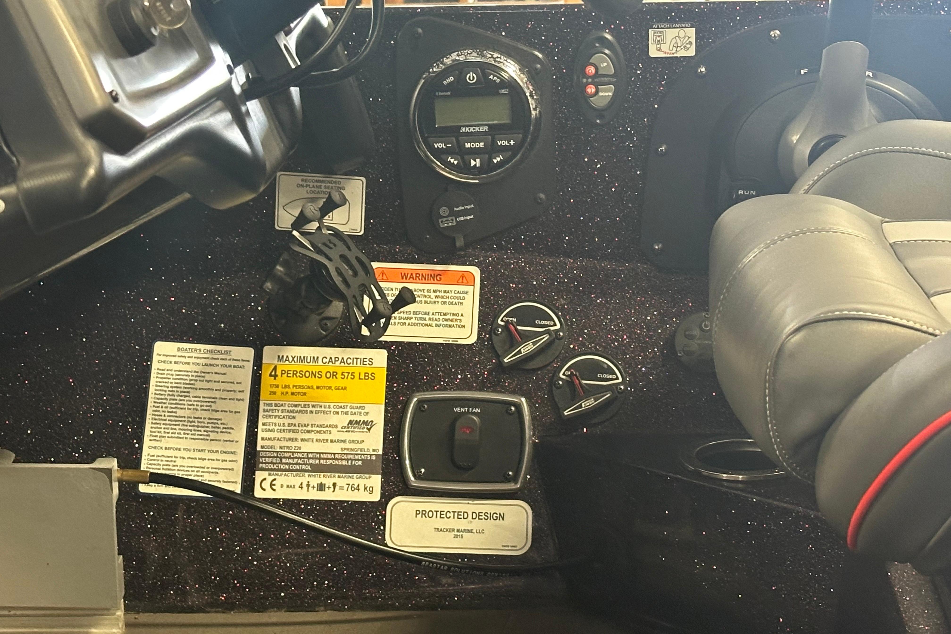 Dashboard of a 2022 Nitro Z20 Pro boat with controls and capacity warnings.
