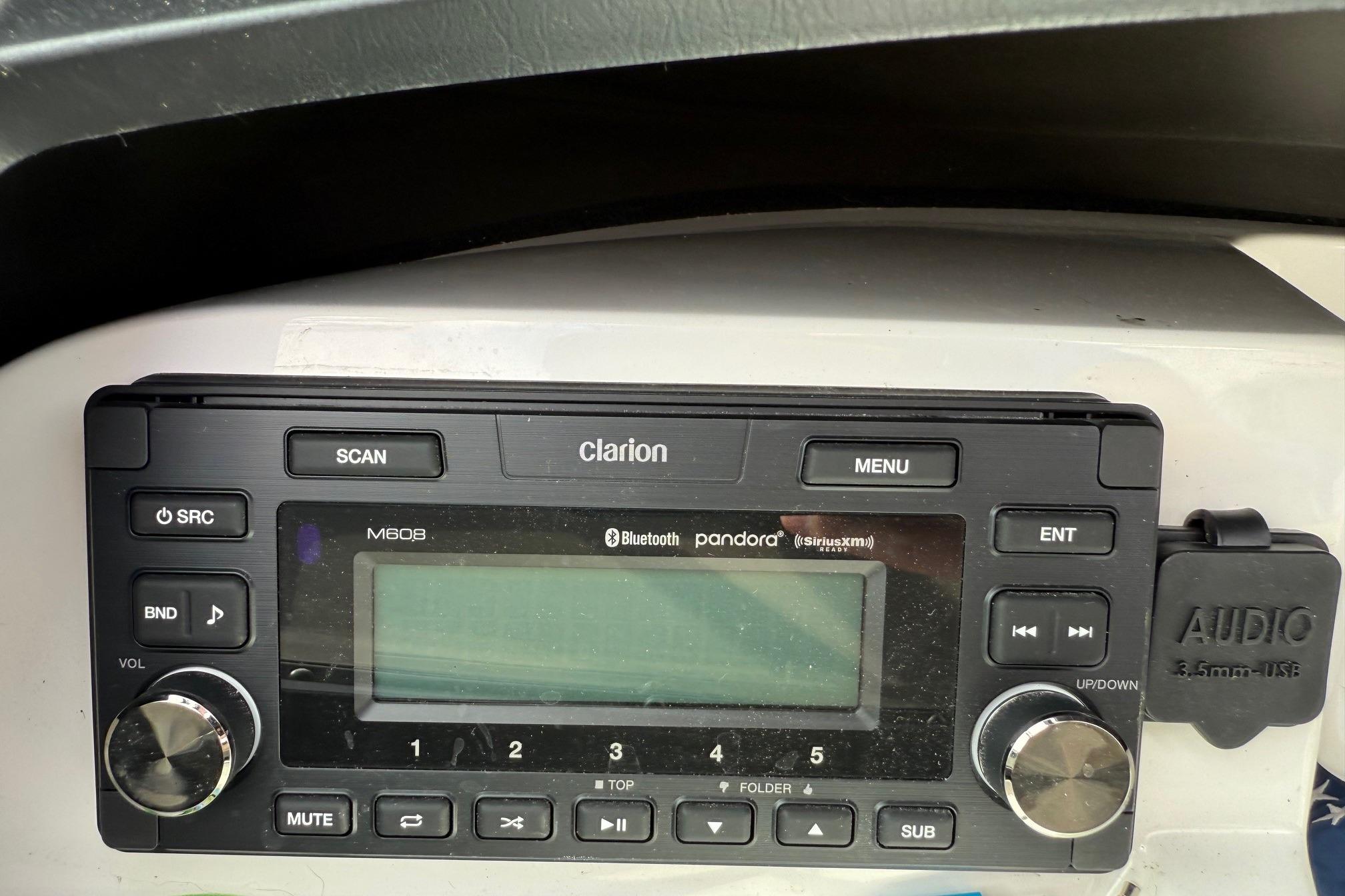 Clarion M608 audio system in a 2008 MasterCraft X-15 boat dashboard.