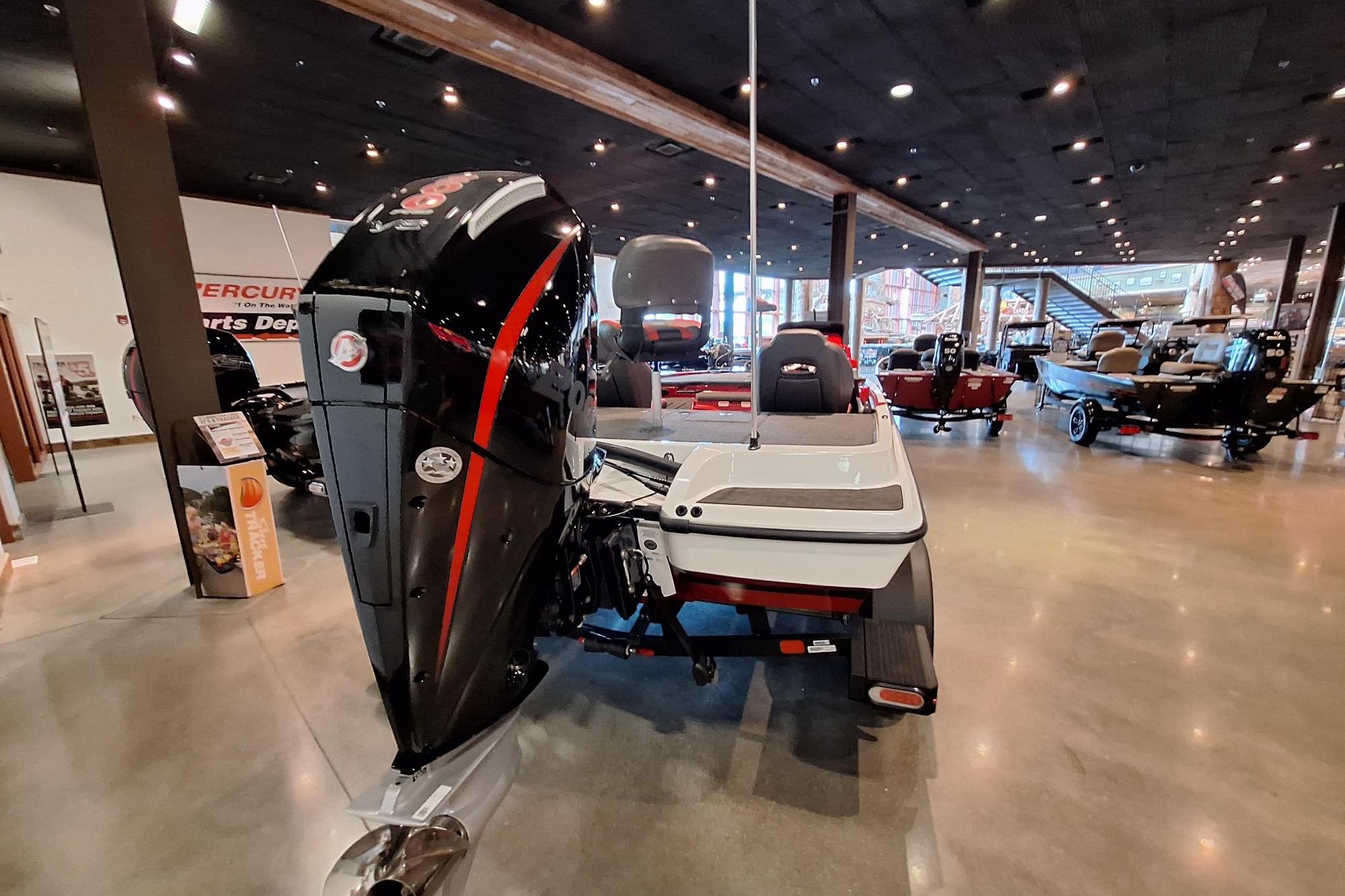 2026 Nitro Z19 XL Pro boat displayed in a showroom with sleek design and powerful engine.