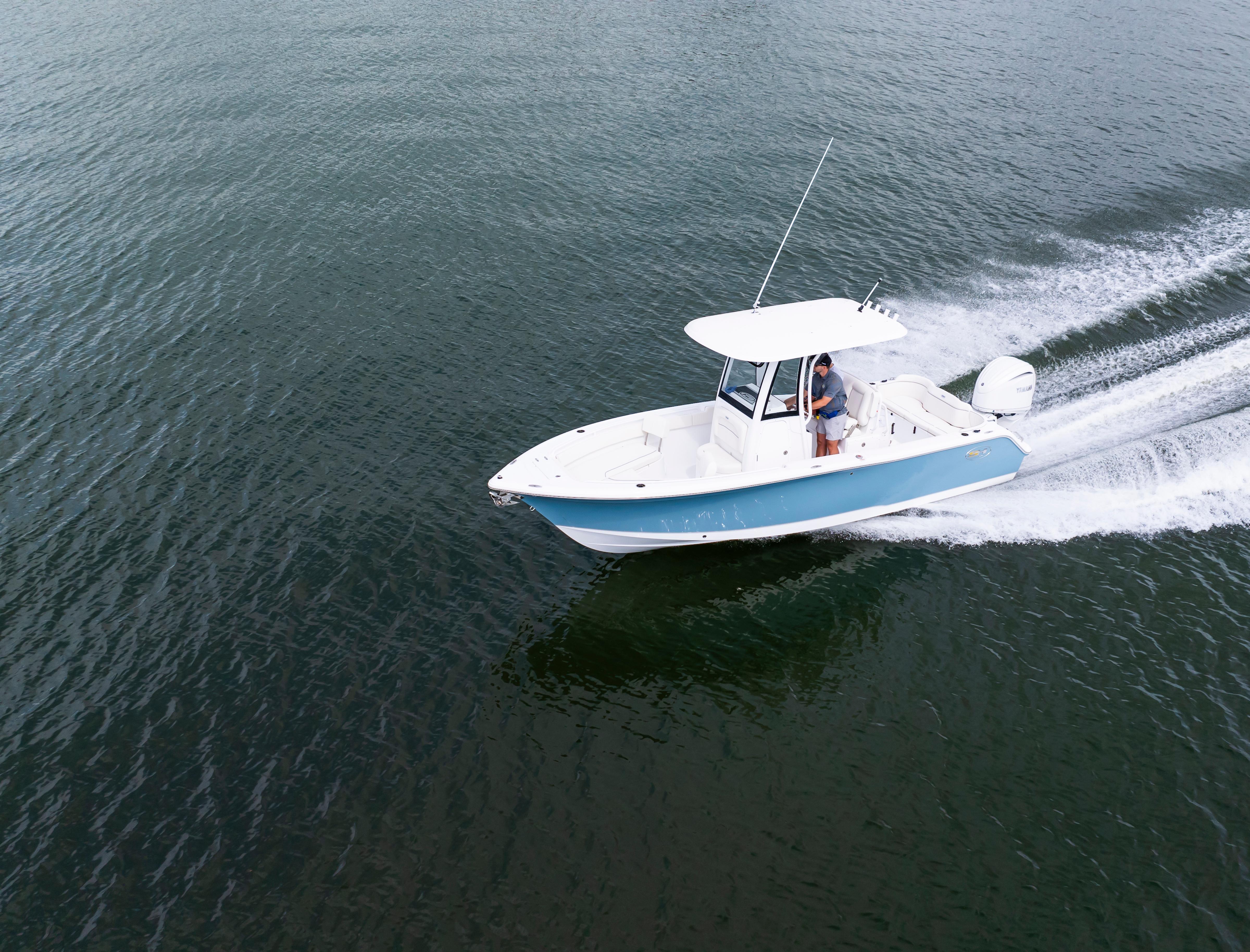 2026 Sea Hunt Ultra 245 SE boat cruising on open water.
