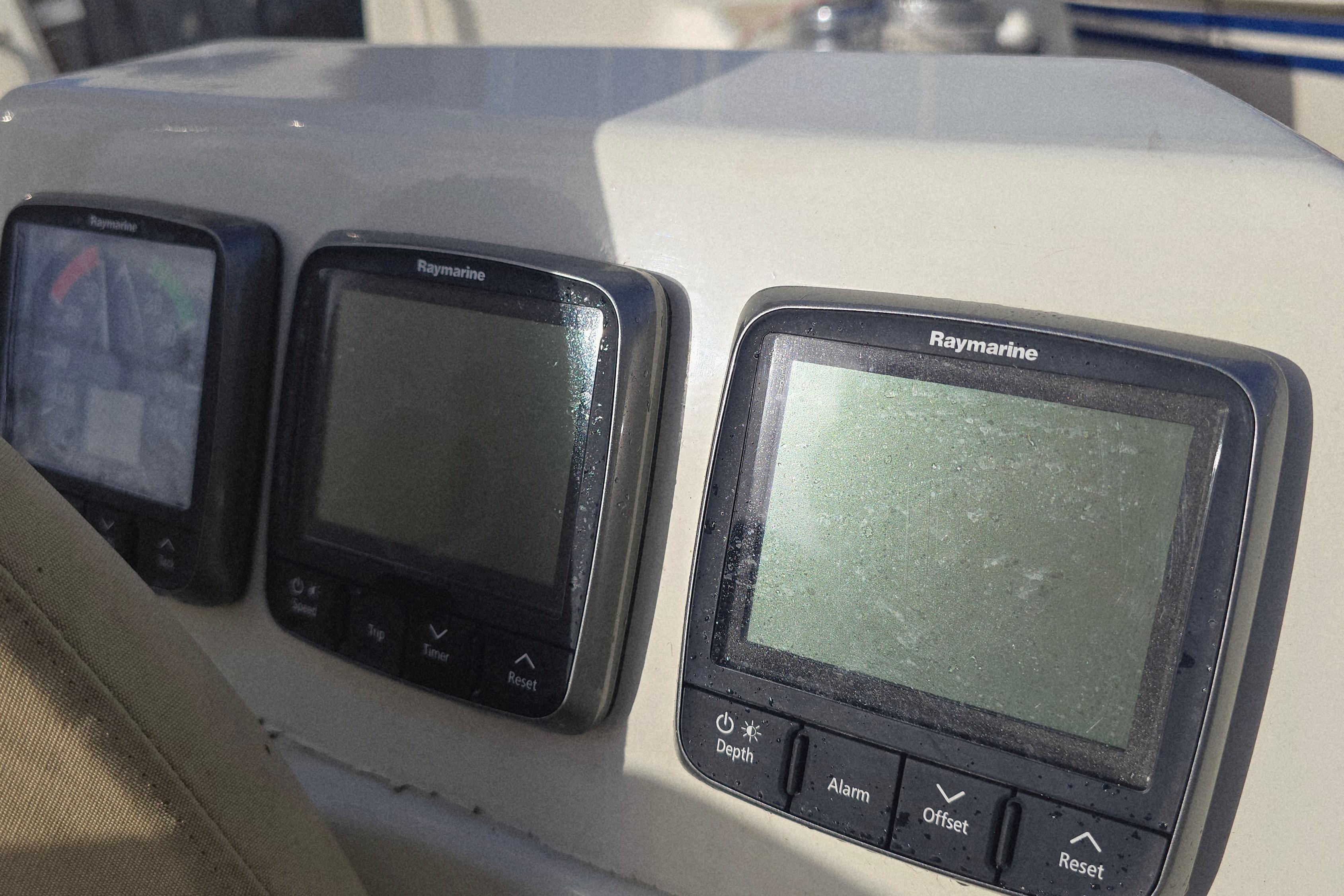 Raymarine navigation instruments on 1965 Van De Stadt Rebel 41 yacht dashboard.