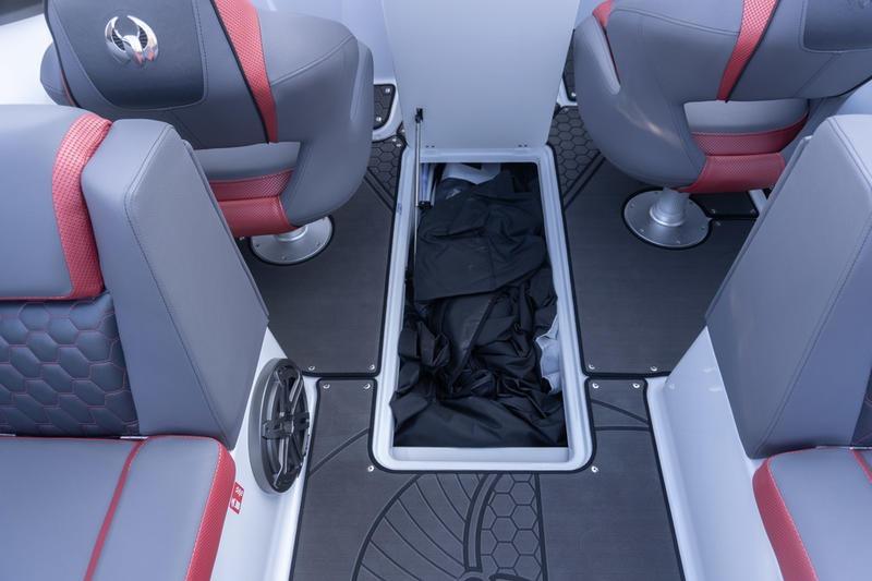 2026 Scarab 255 LX Wake boat interior with storage compartment and stylish seating.