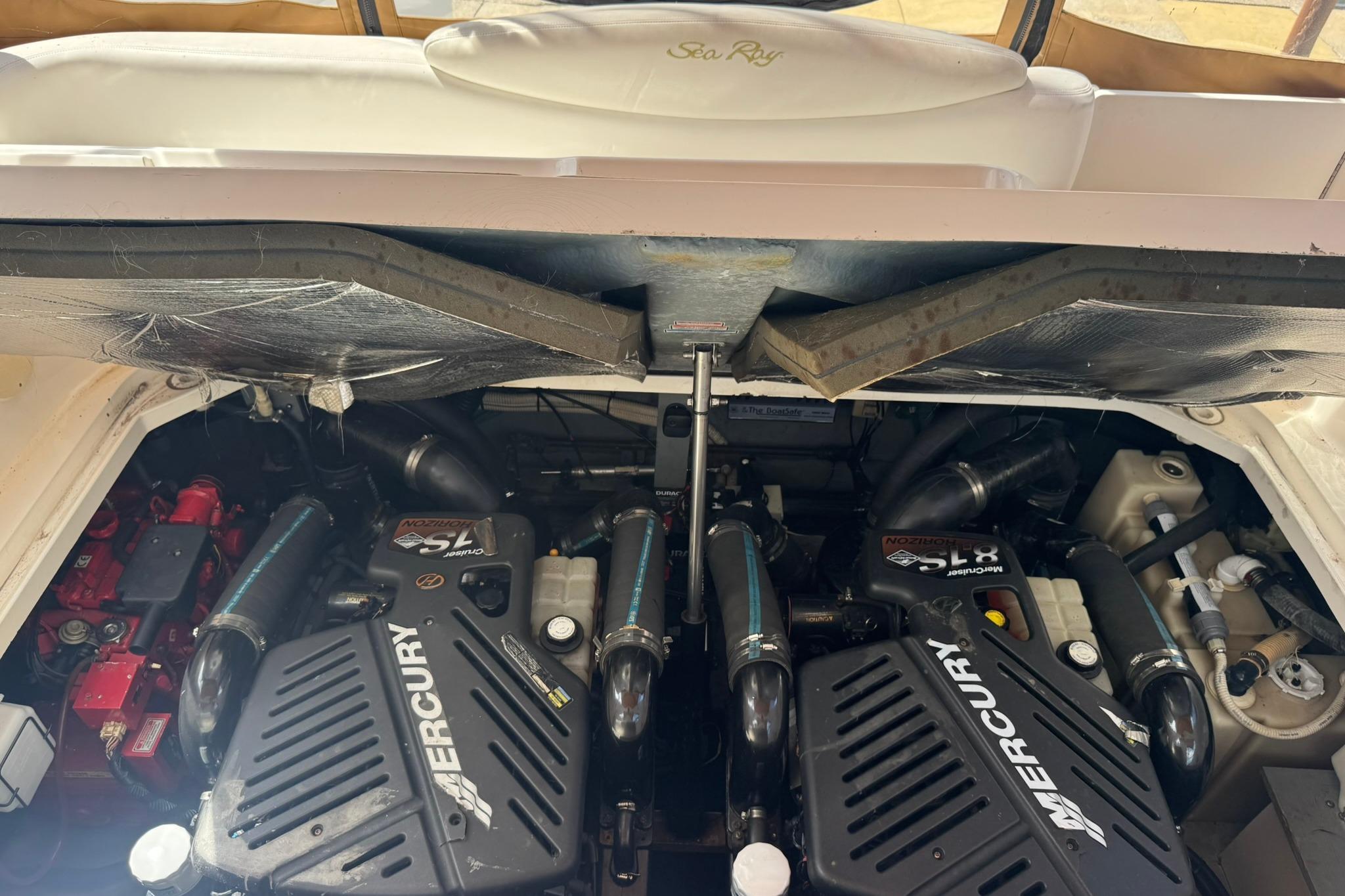 Engine compartment of a 2001 Sea Ray 340 Sundancer with Mercury engines.