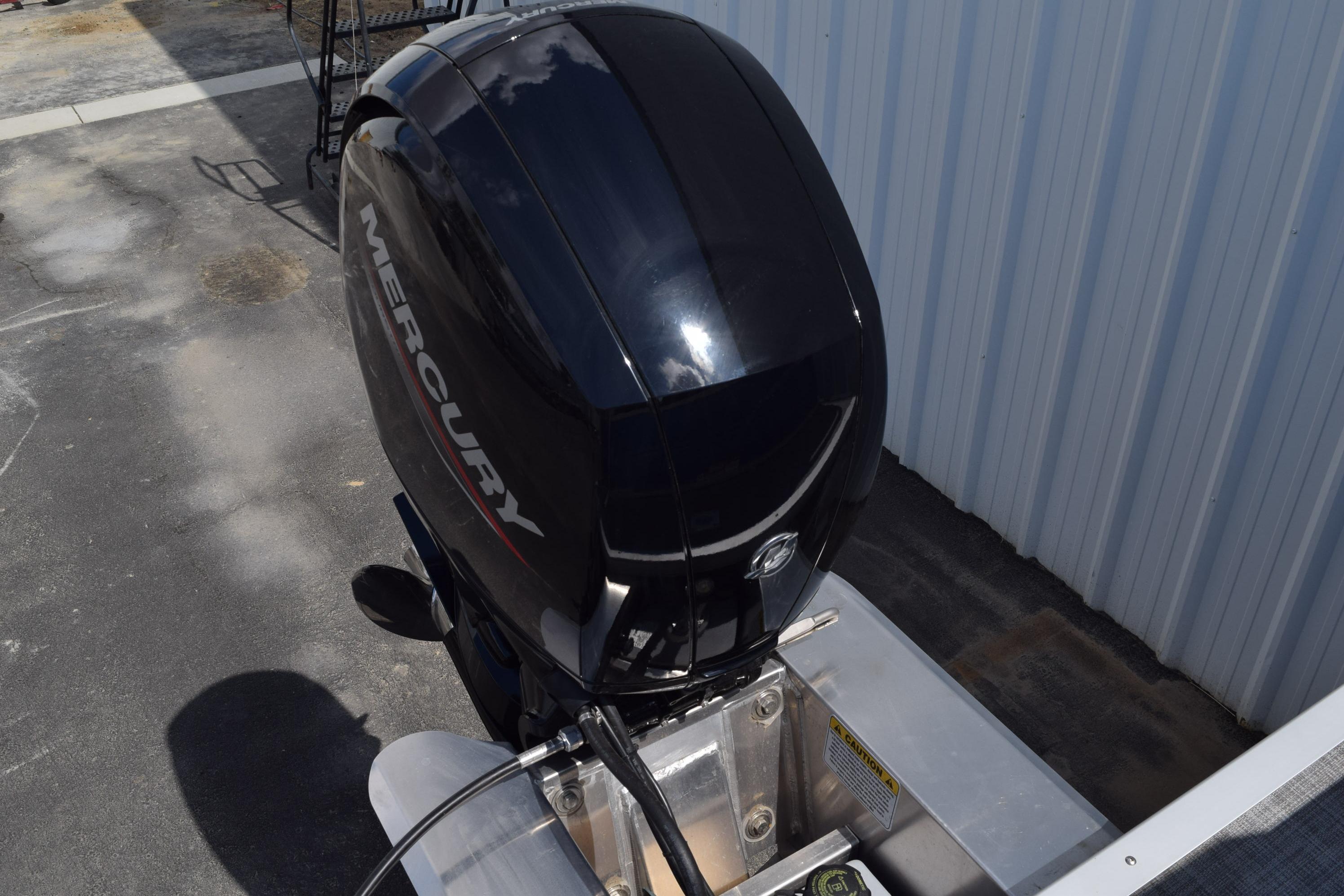 Mercury outboard motor on 2026 Sun Tracker Party Barge 22 RF DLX pontoon boat.