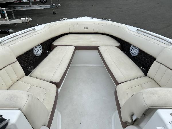 2010 Cobalt 262 boat interior with white cushioned seating.