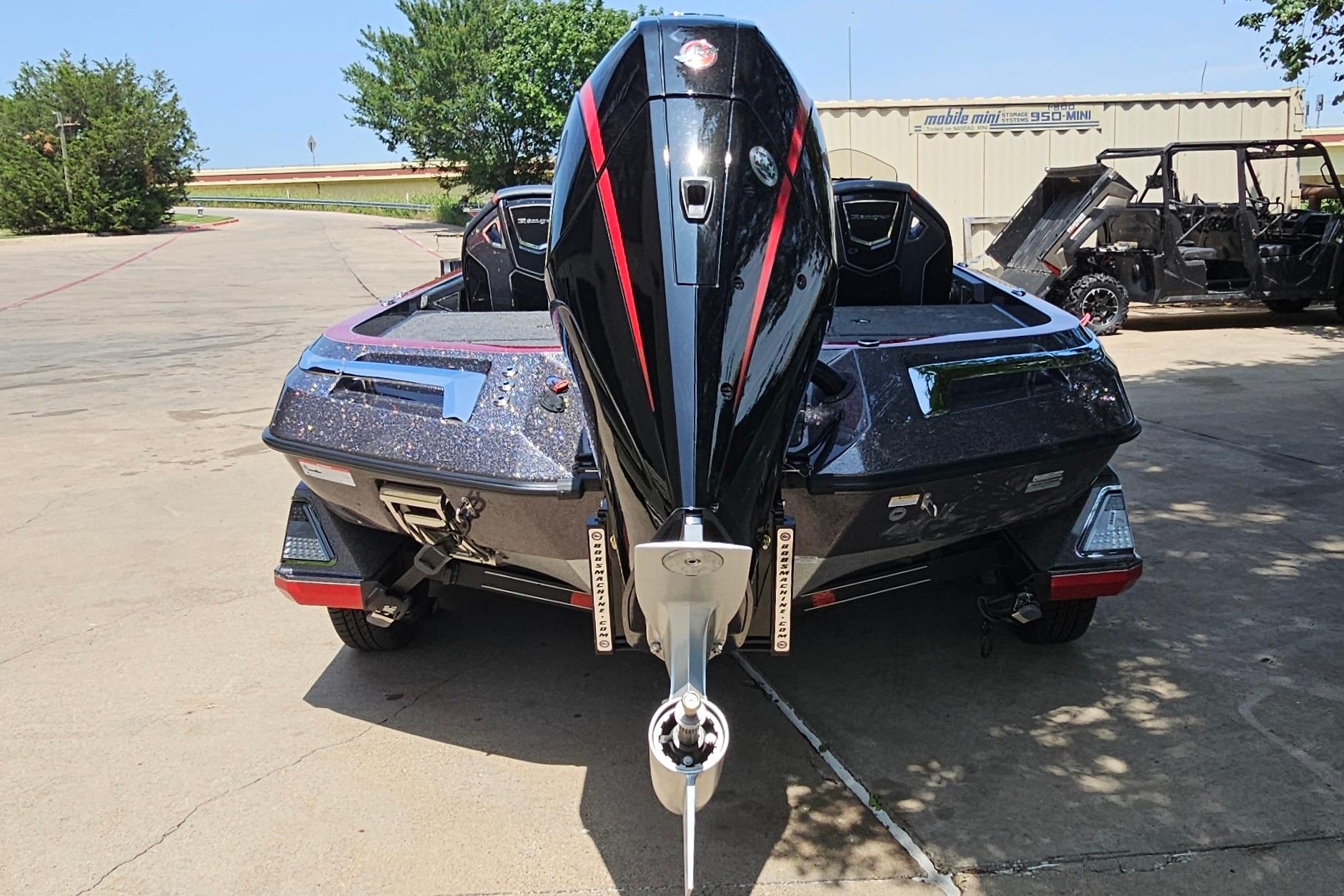 2026 Ranger Z520R boat with powerful outboard motor, parked outdoors.