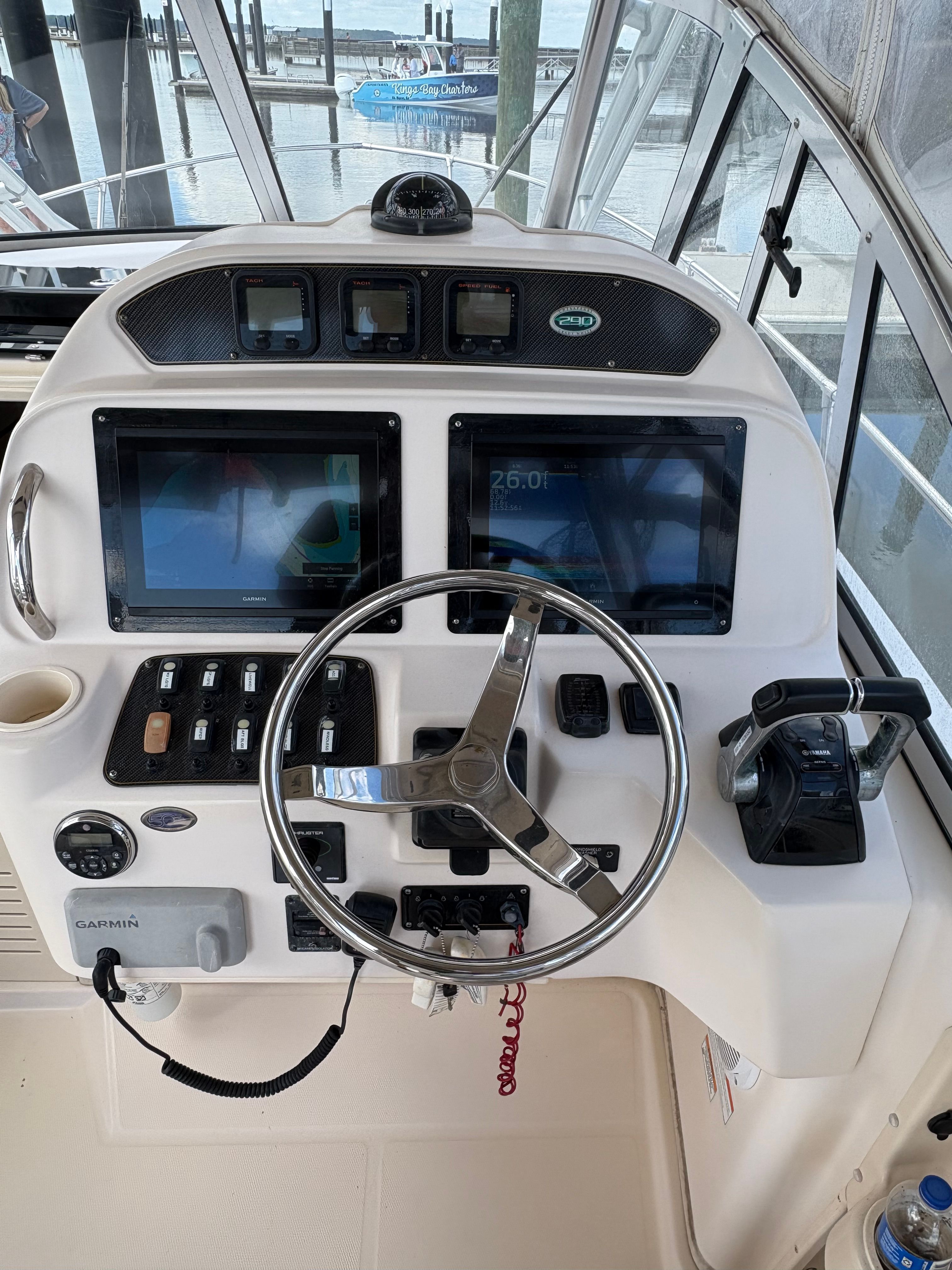 Helm console of a 2009 Grady-White Chesapeake 290 boat.
