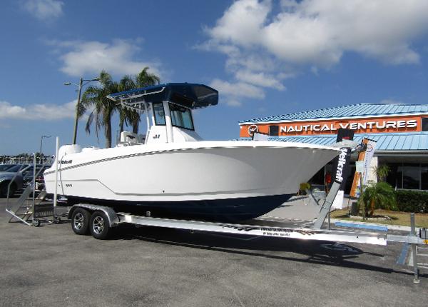 2024 Wellcraft 263 Fisherman boat on a trailer at Nautical Ventures dealership.