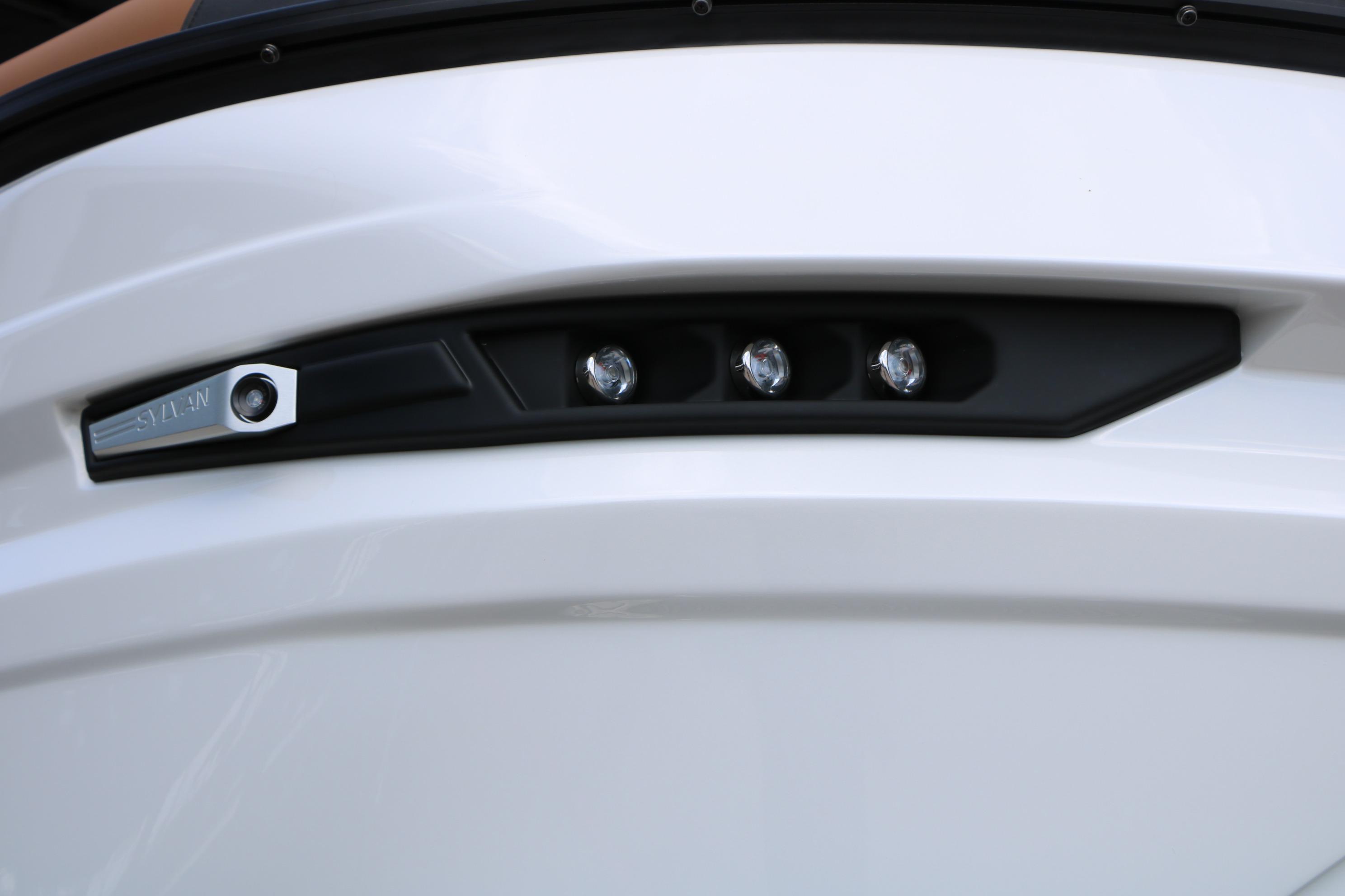 2026 Sylvan L3 DLZ Bar Platinum Edition Tri-Toon boat detail with sleek design elements.