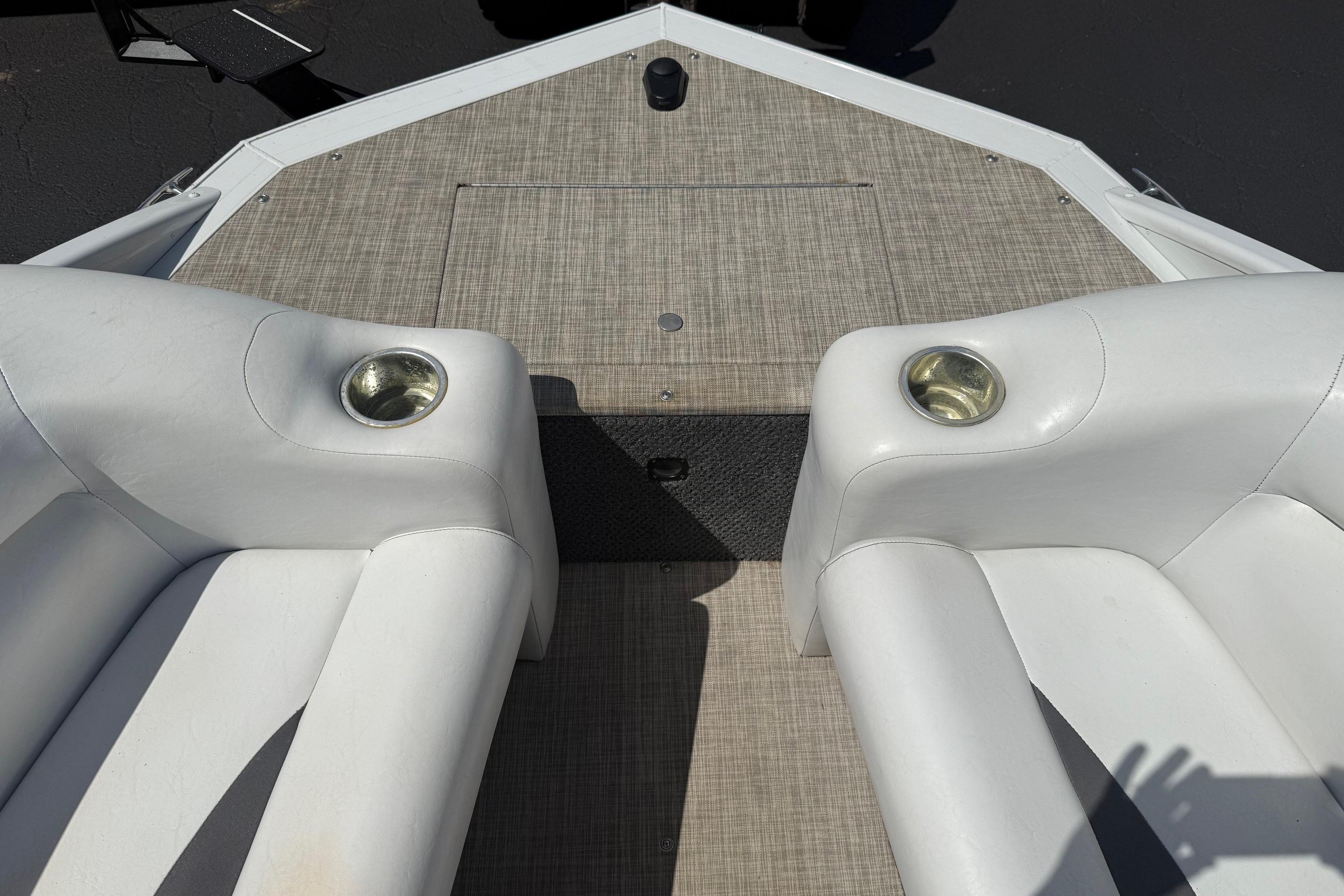 2019 Princecraft Ventura 190 boat interior with white seating and cup holders.