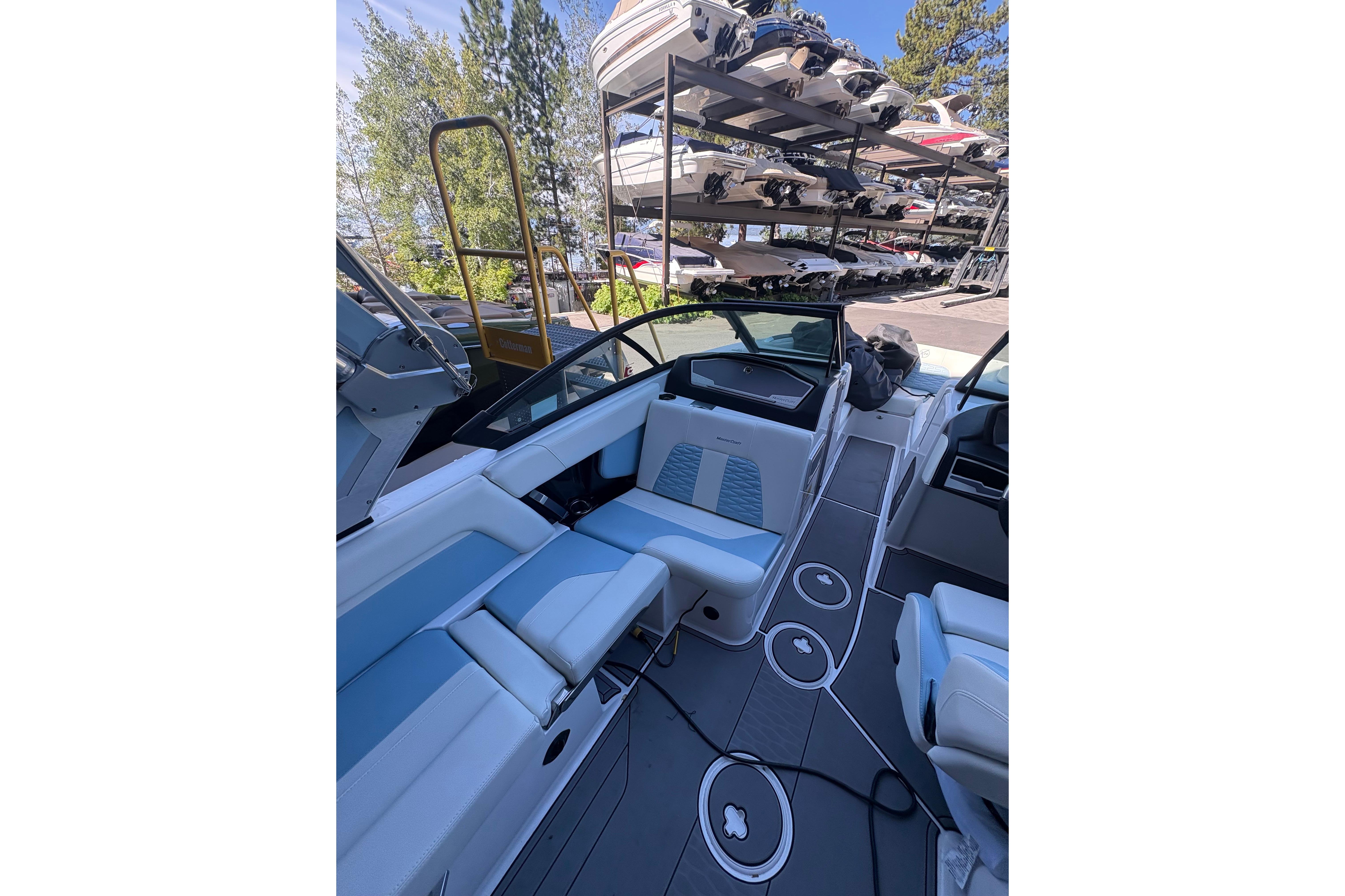 2022 MasterCraft X24 boat interior with sleek seating and modern design.