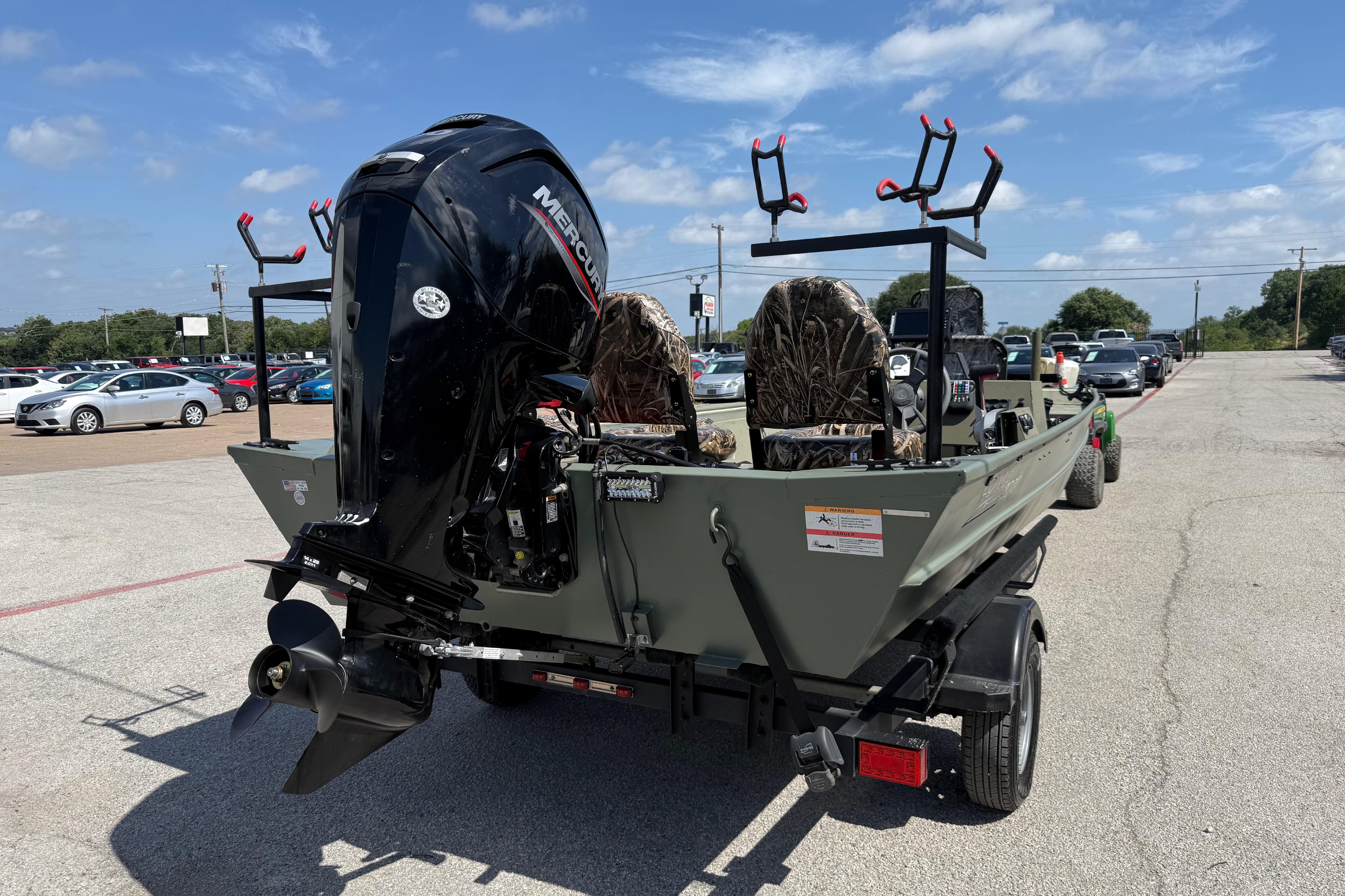 The image shows a 2020 Lowe Roughneck 2070 Big River boat on a trailer.