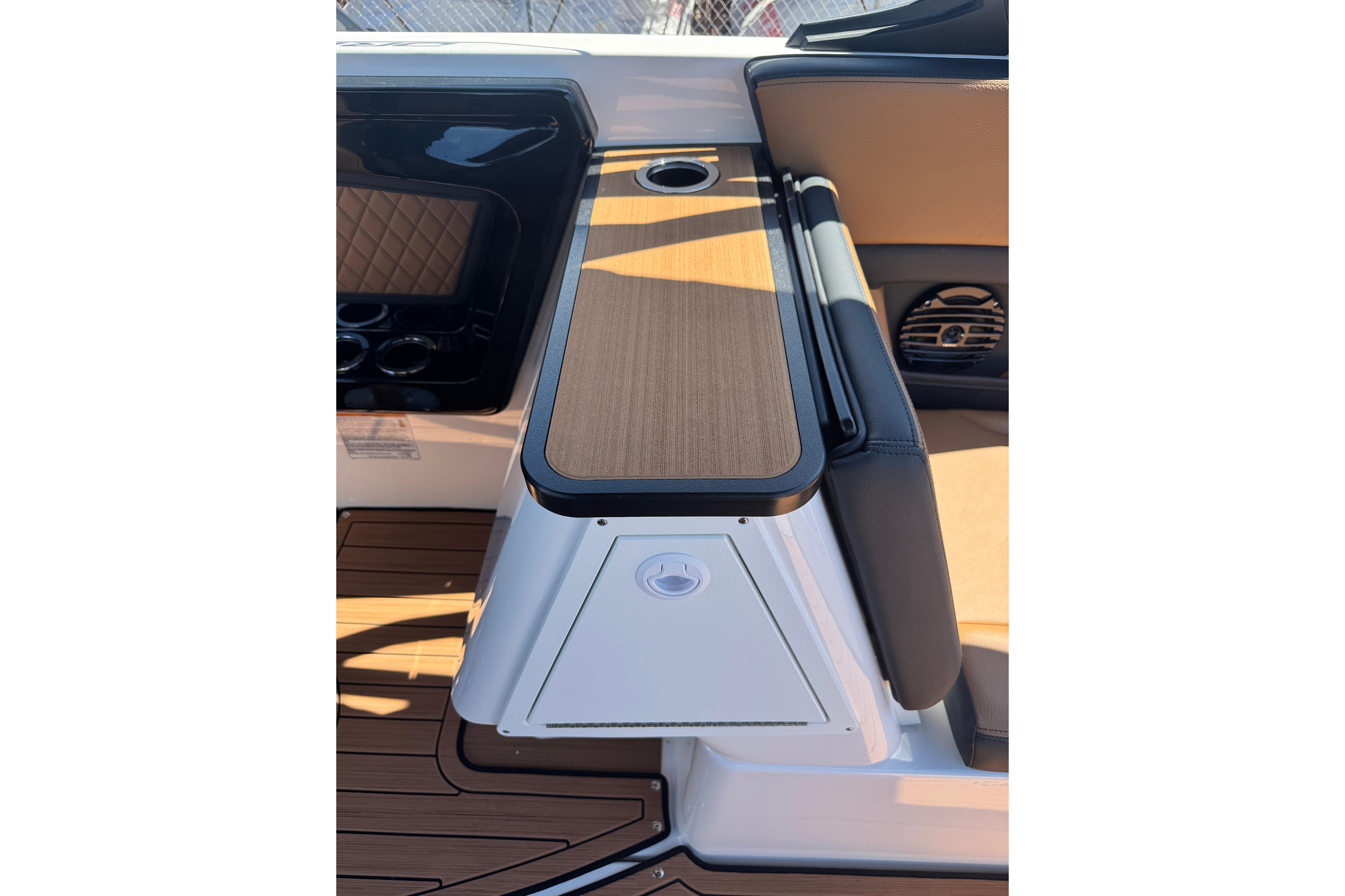2026 Yamaha Boats 252SD interior with wood finish and cup holder.