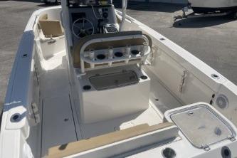 2023 Trophy T24 CC boat interior with seating and console, showcasing modern design and functionality.
