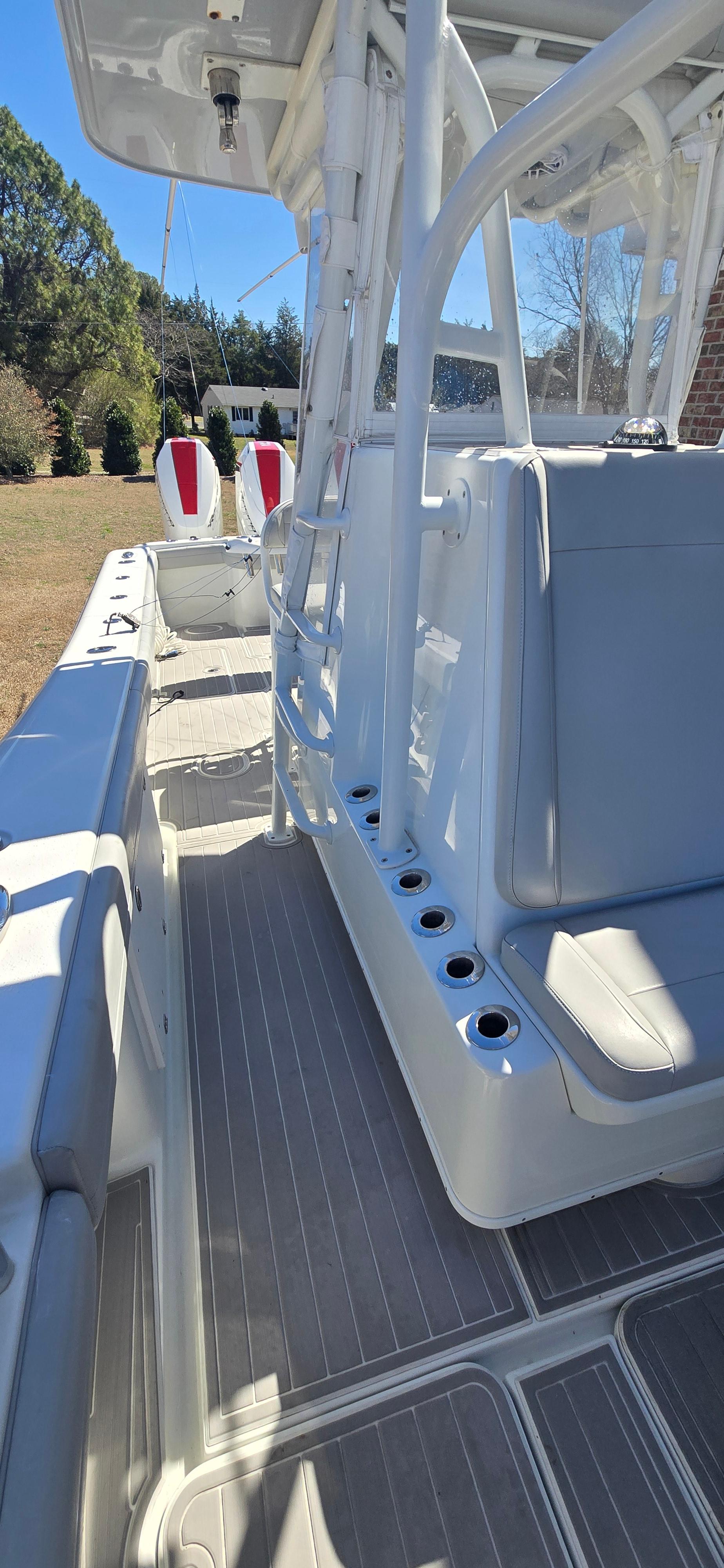 2017 Yellowfin 36 boat interior with seating and rod holders.