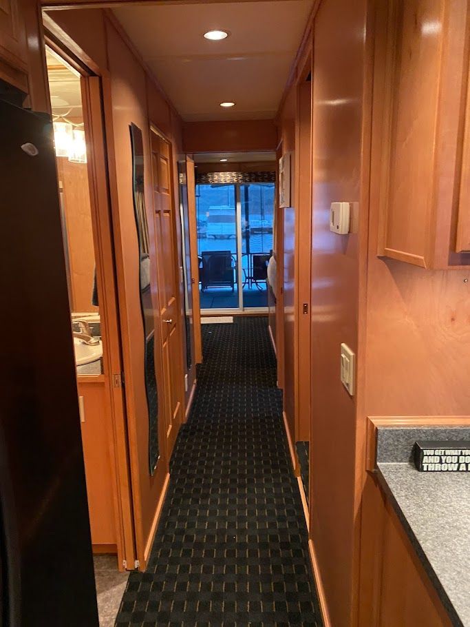 Interior view of a 2006 Summersun Houseboats 16x68 model.