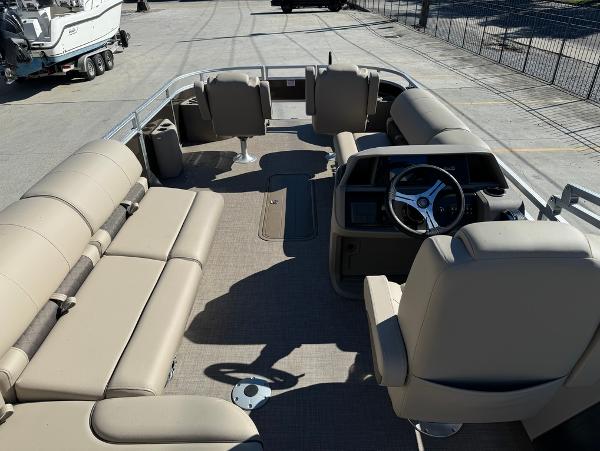2025 Sun Tracker 24 Sportfish XP3 pontoon boat with spacious seating and modern helm.
