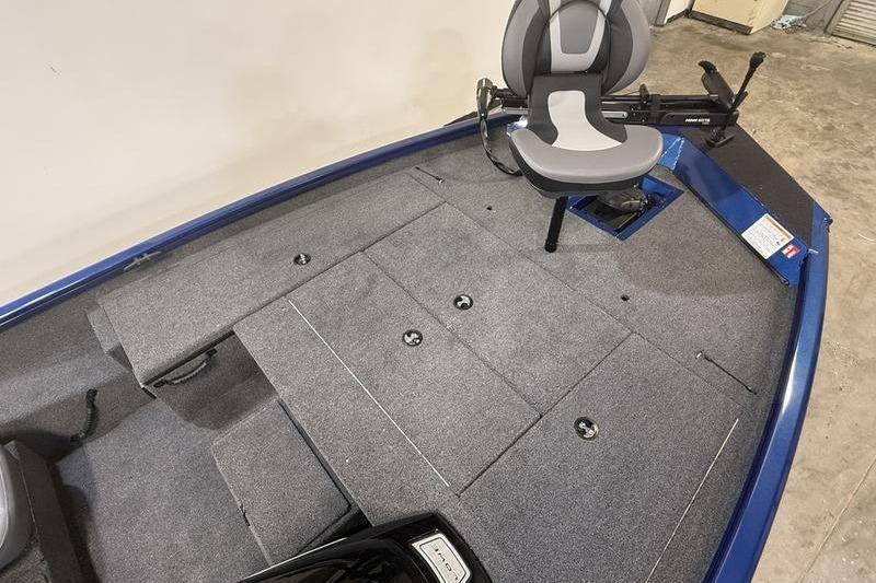 2026 Lowe Stinger 175C boat interior with gray carpet and swivel seat.
