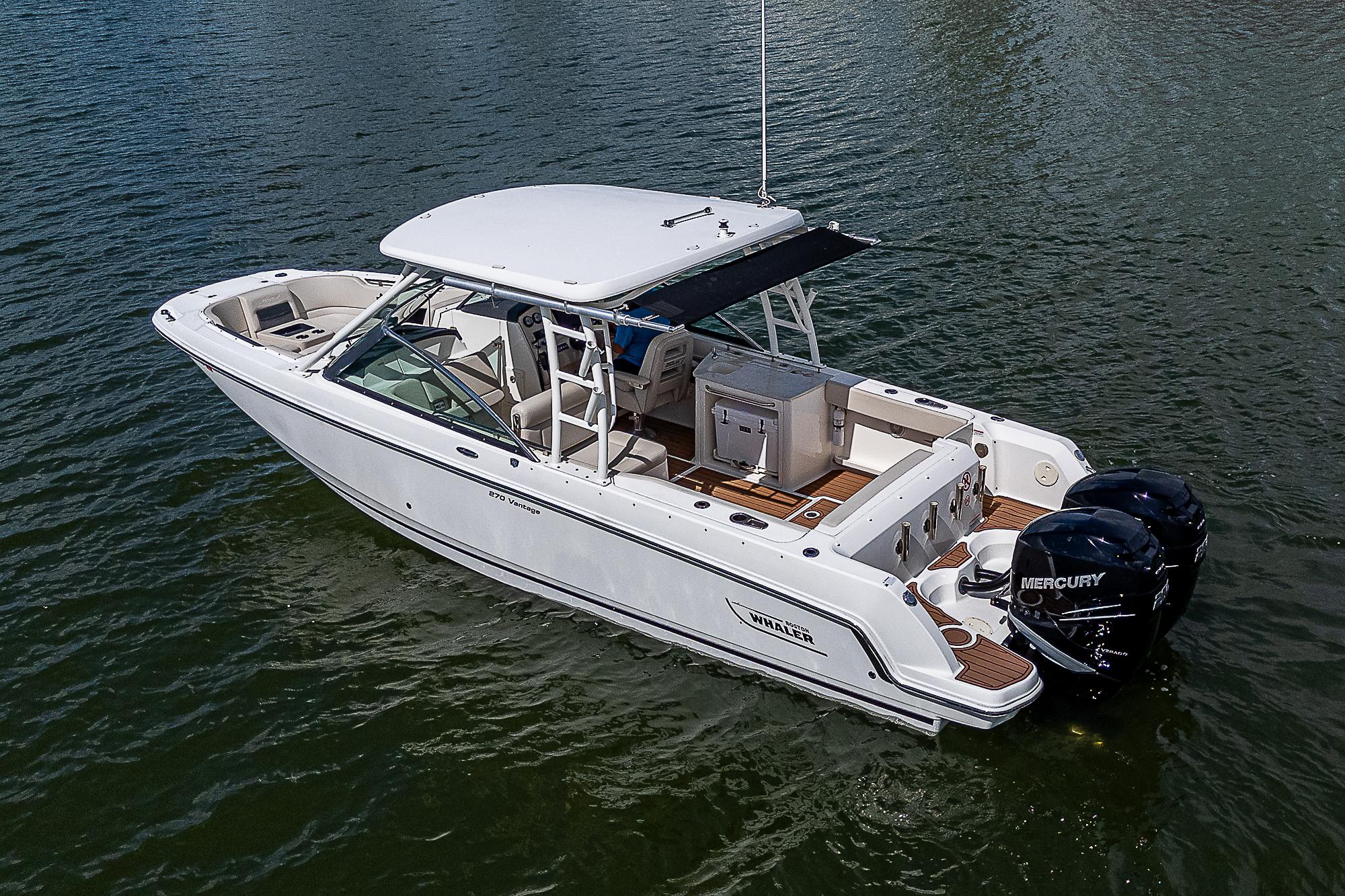 2018 Boston Whaler 270 Vantage boat on water, featuring dual Mercury engines.