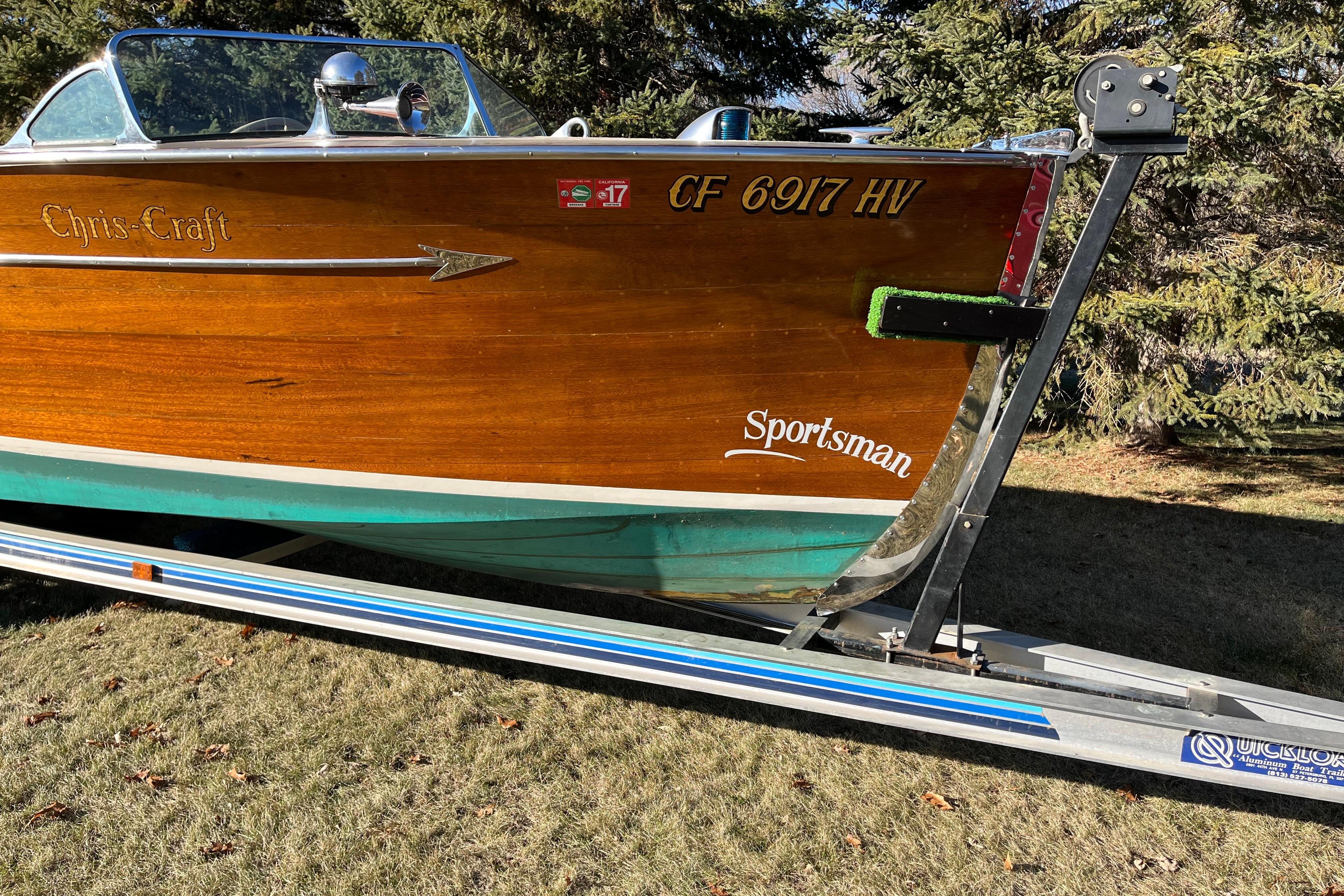 1938 Chris-Craft 28 Sportsman boat on trailer, showcasing classic wooden design.