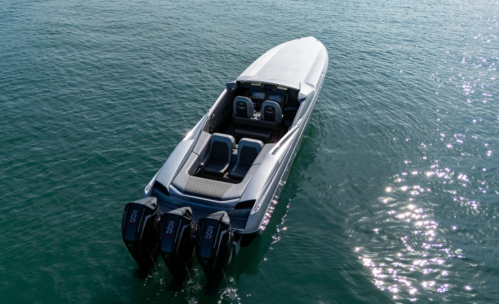 2017 Nor-Tech 3900 Super-VEE boat with triple engines on calm water.