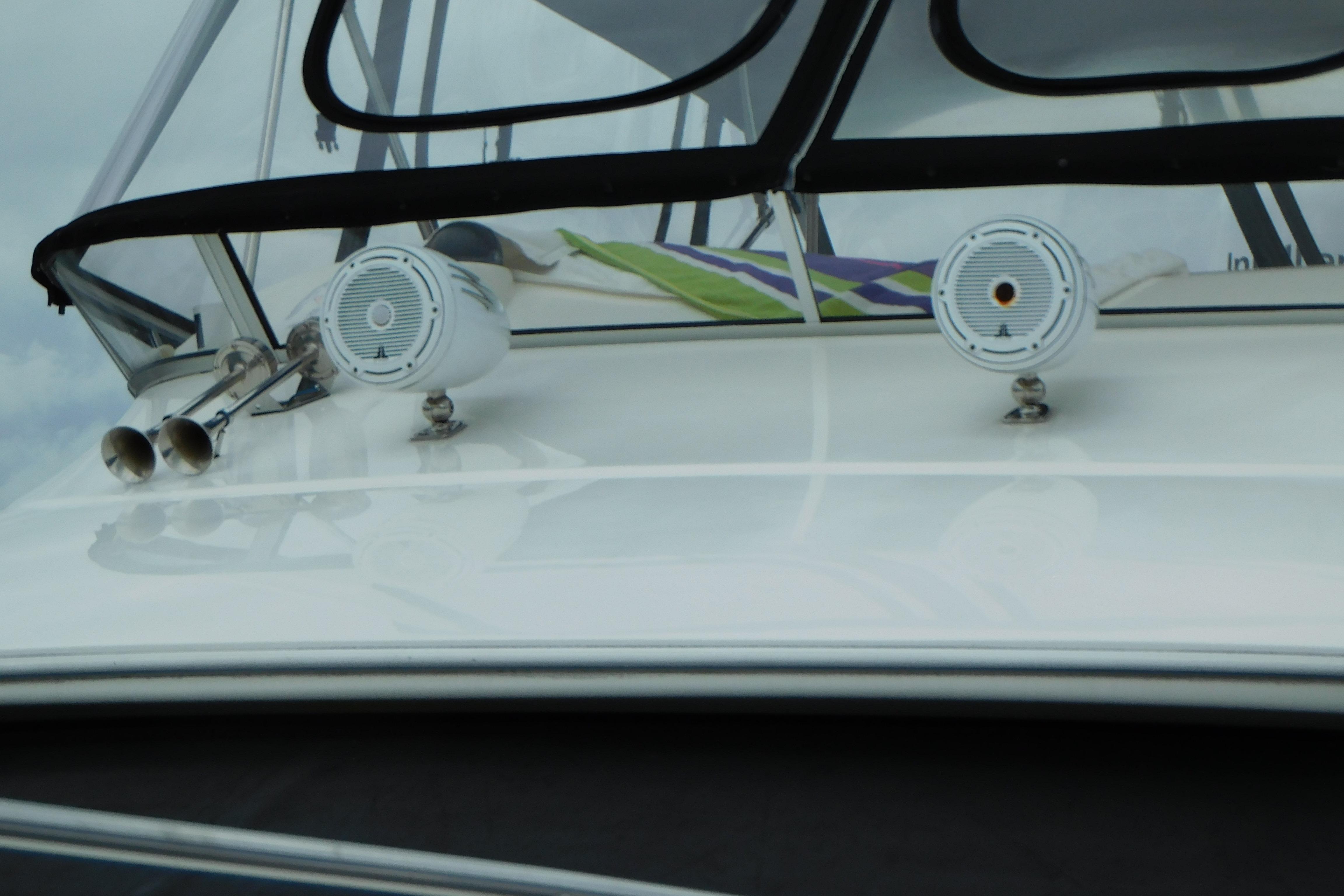2009 Meridian 391 Sedan yacht with speakers and horn on deck.