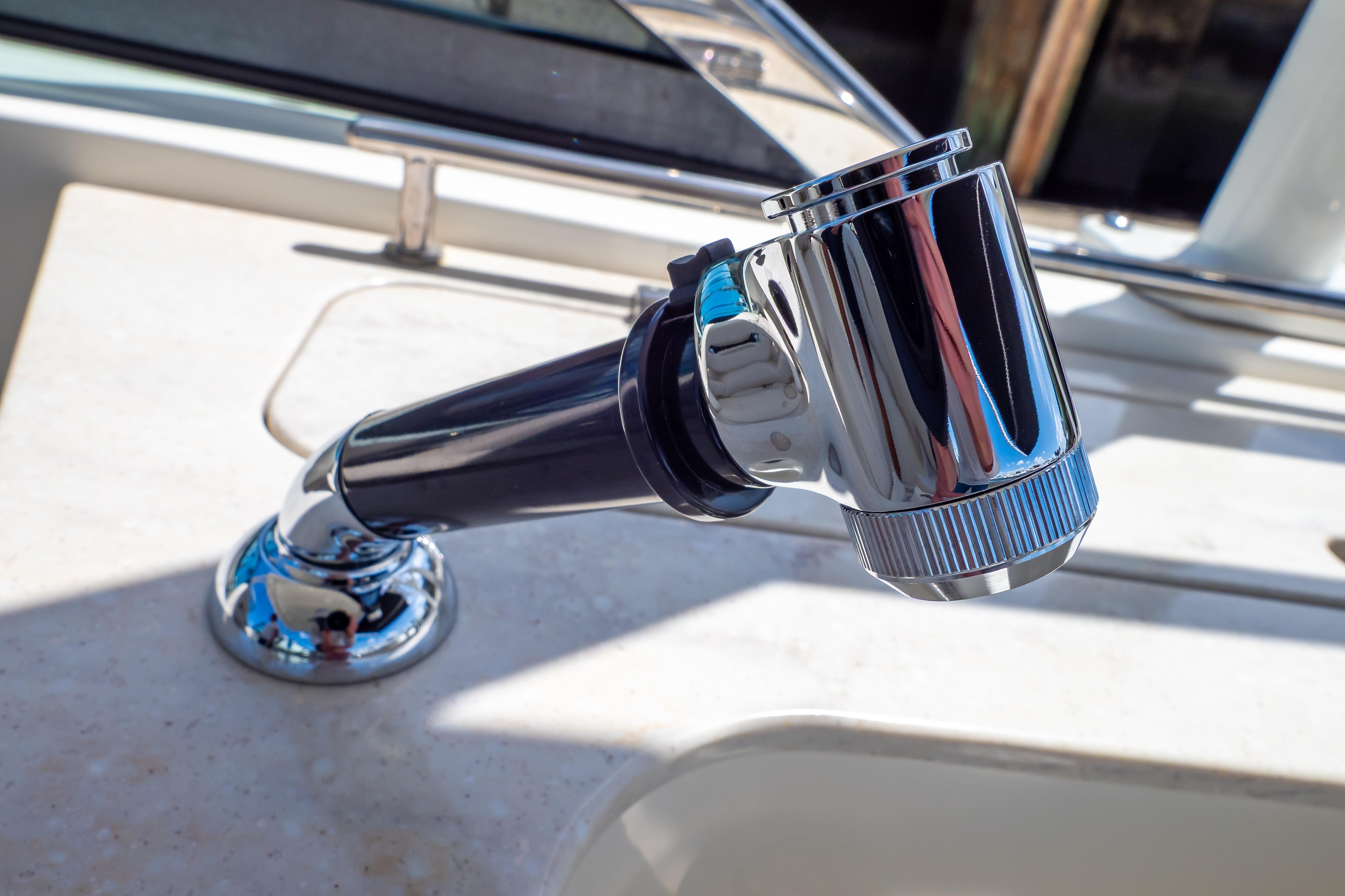 Chrome faucet on 2019 Boston Whaler 270 Vantage boat, close-up view.