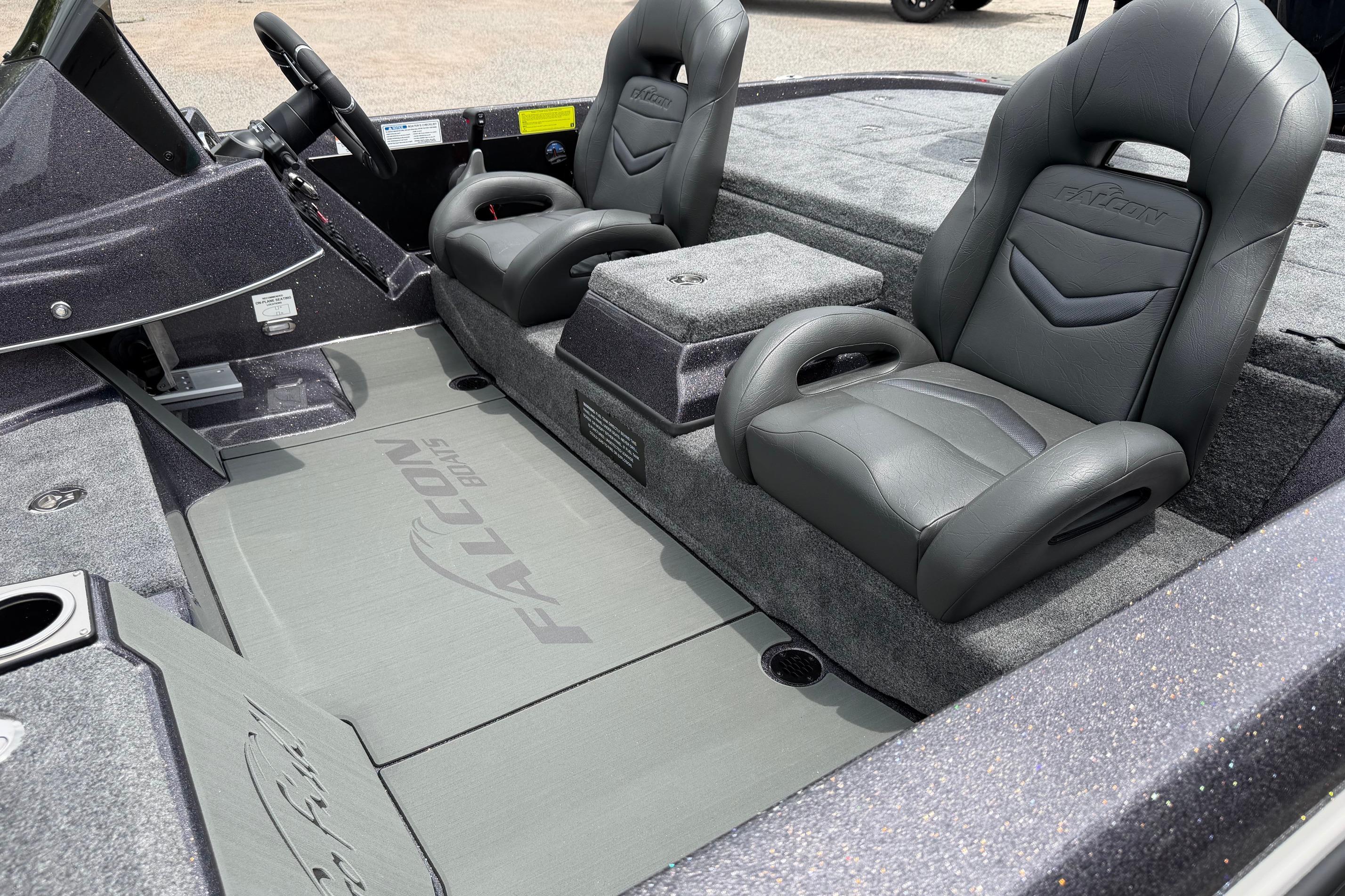 Interior of 2027 Falcon Boats F215 featuring sleek gray seating and modern design.