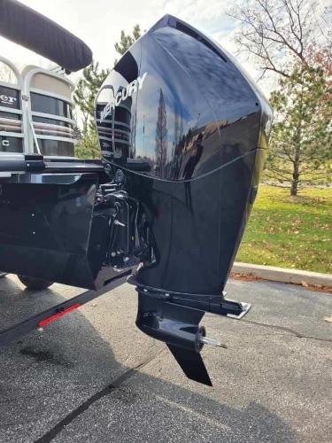 2023 Ranger Reata 243C boat with a Mercury outboard motor.