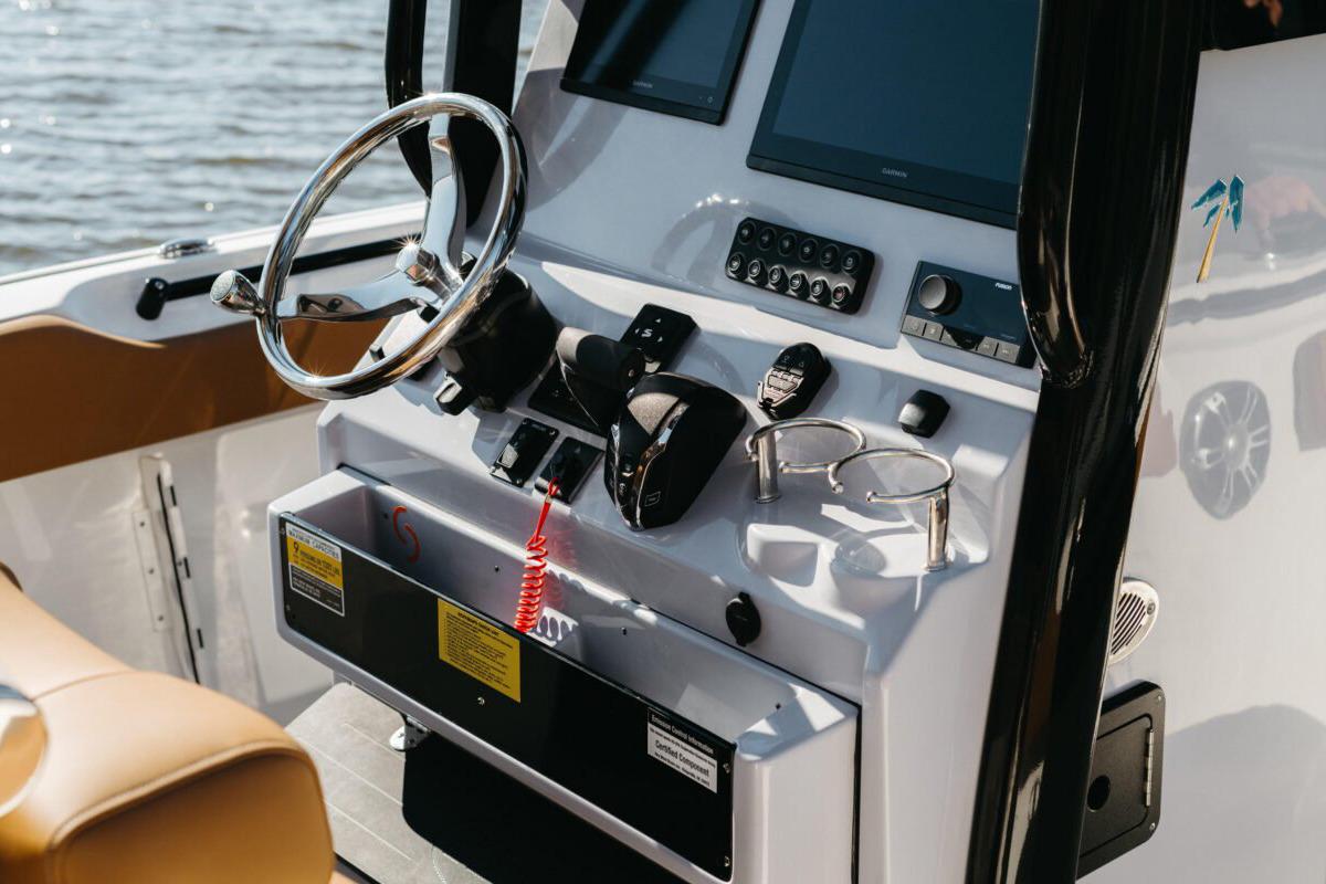 Manufacturer Provided Image: 2025 Key West 239 FSR boat dashboard with steering wheel and control panel.