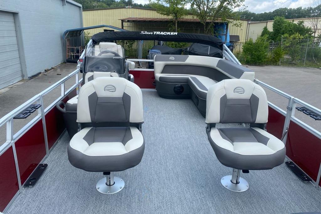 2026 Sun Tracker Bass Buggy 16 XL Select pontoon boat with comfortable seating.