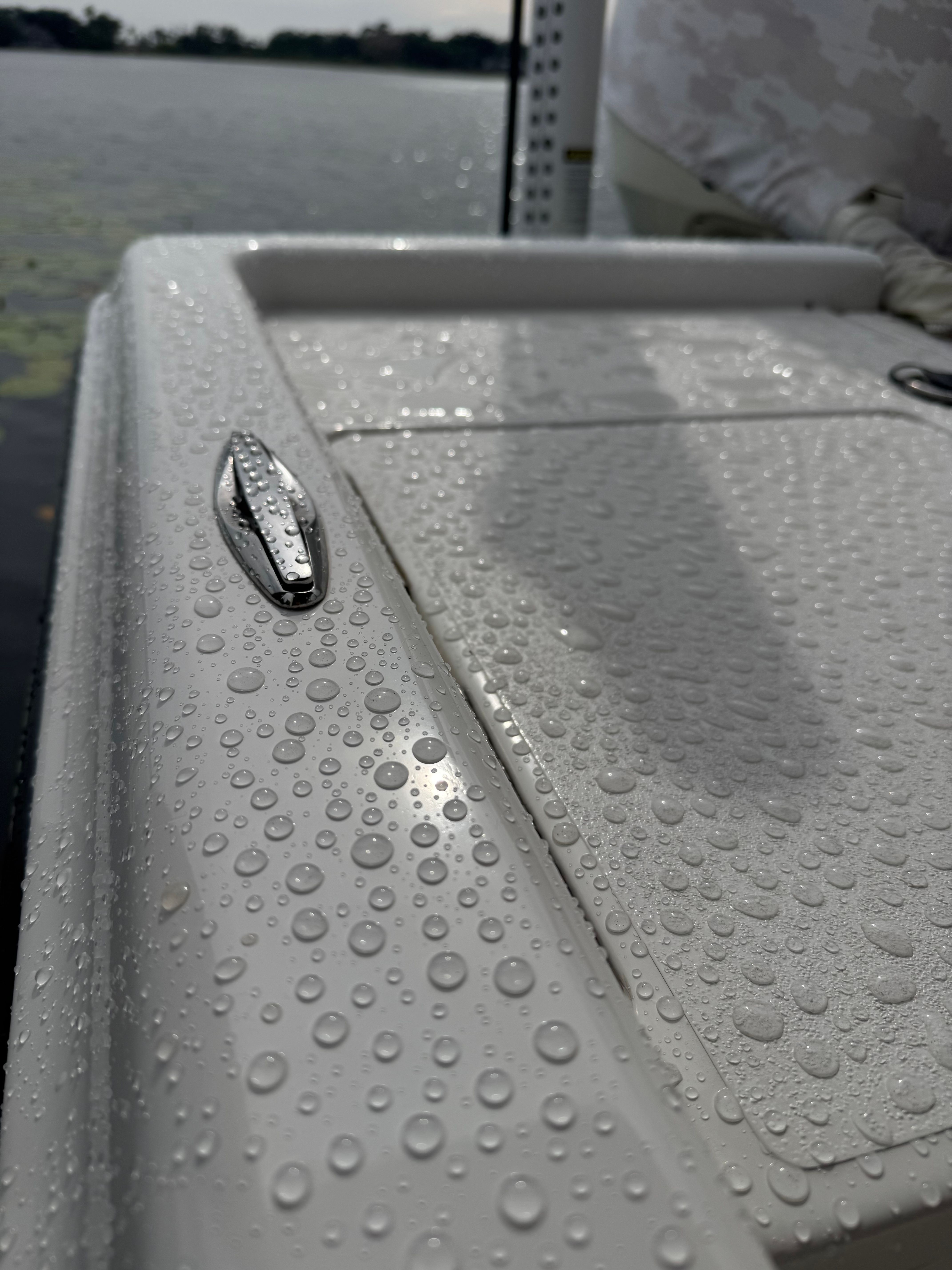 Close-up of a 2004 ShearWater LTZ boat with water droplets.