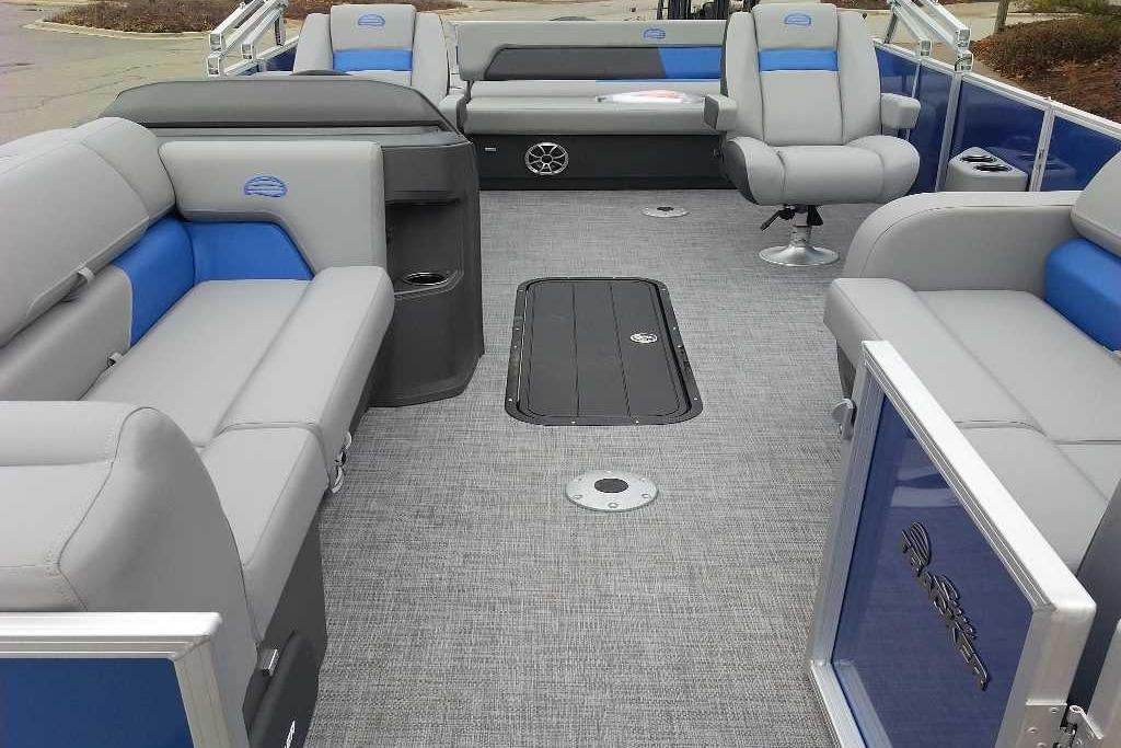 2026 Sun Tracker Party Barge 22 RF XP3 interior with gray and blue seating.