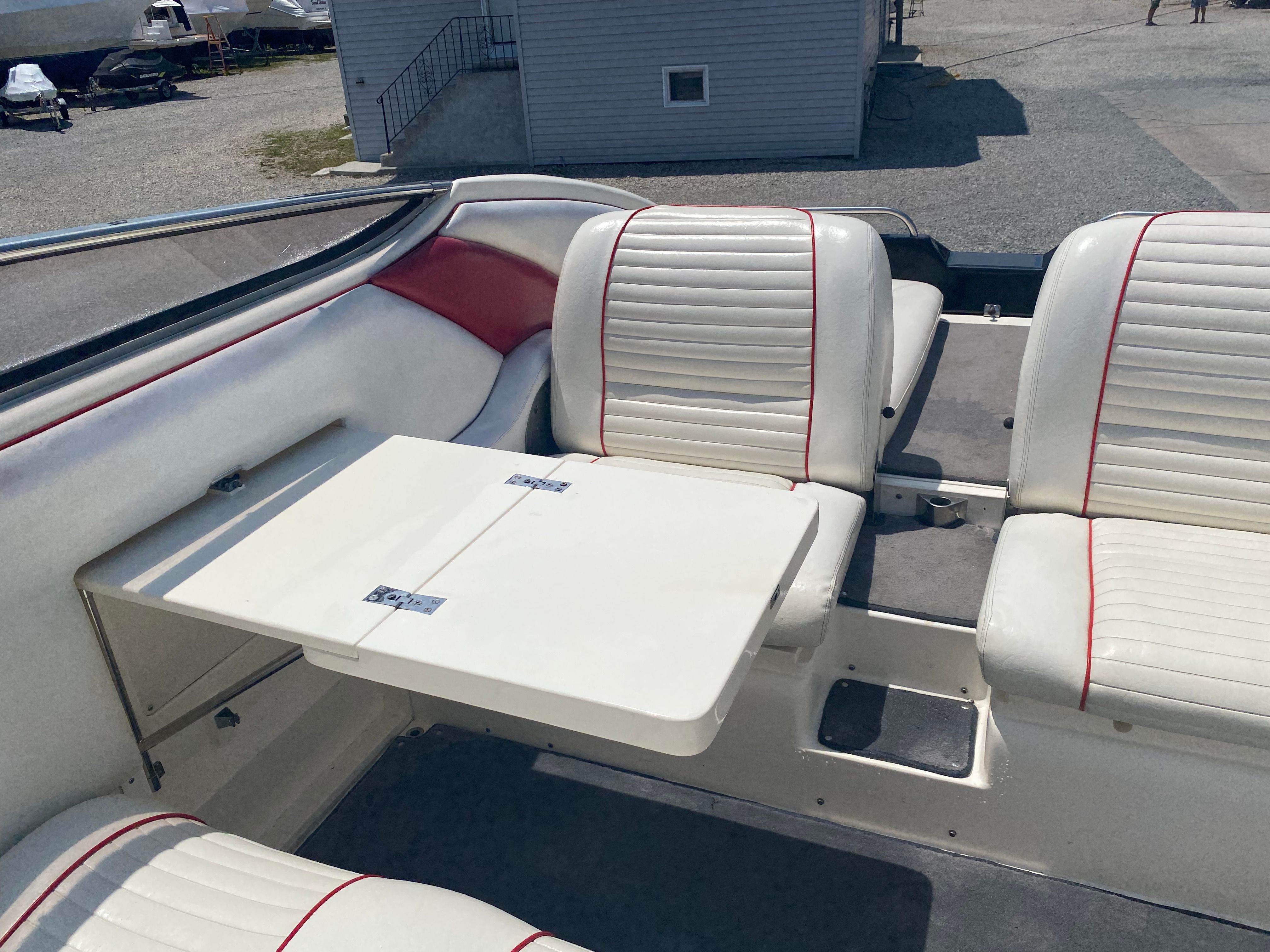 Interior of a 1994 Sunseeker Hawk 31 boat with white seating.