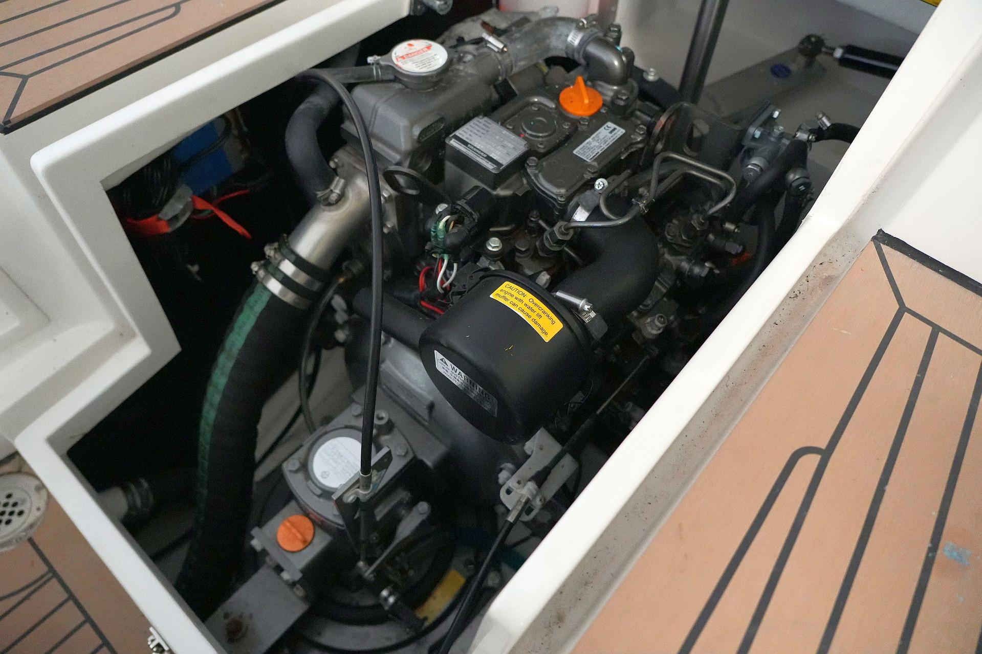 Engine compartment of 2022 Saffier SC 8M Cabin sailboat, showcasing detailed mechanical components.