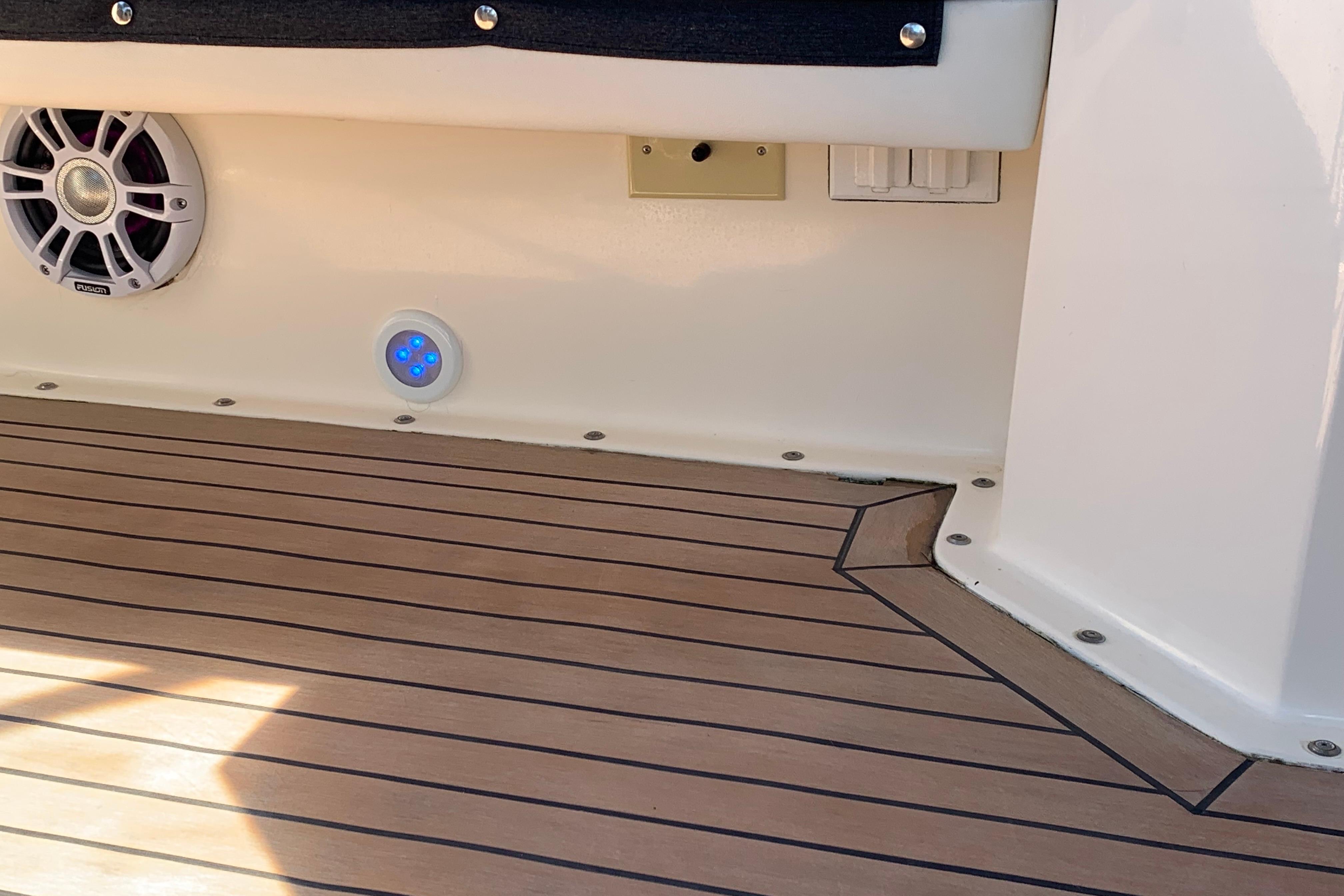 1991 Hatteras 40 Motor Yacht deck with speaker and LED lights.