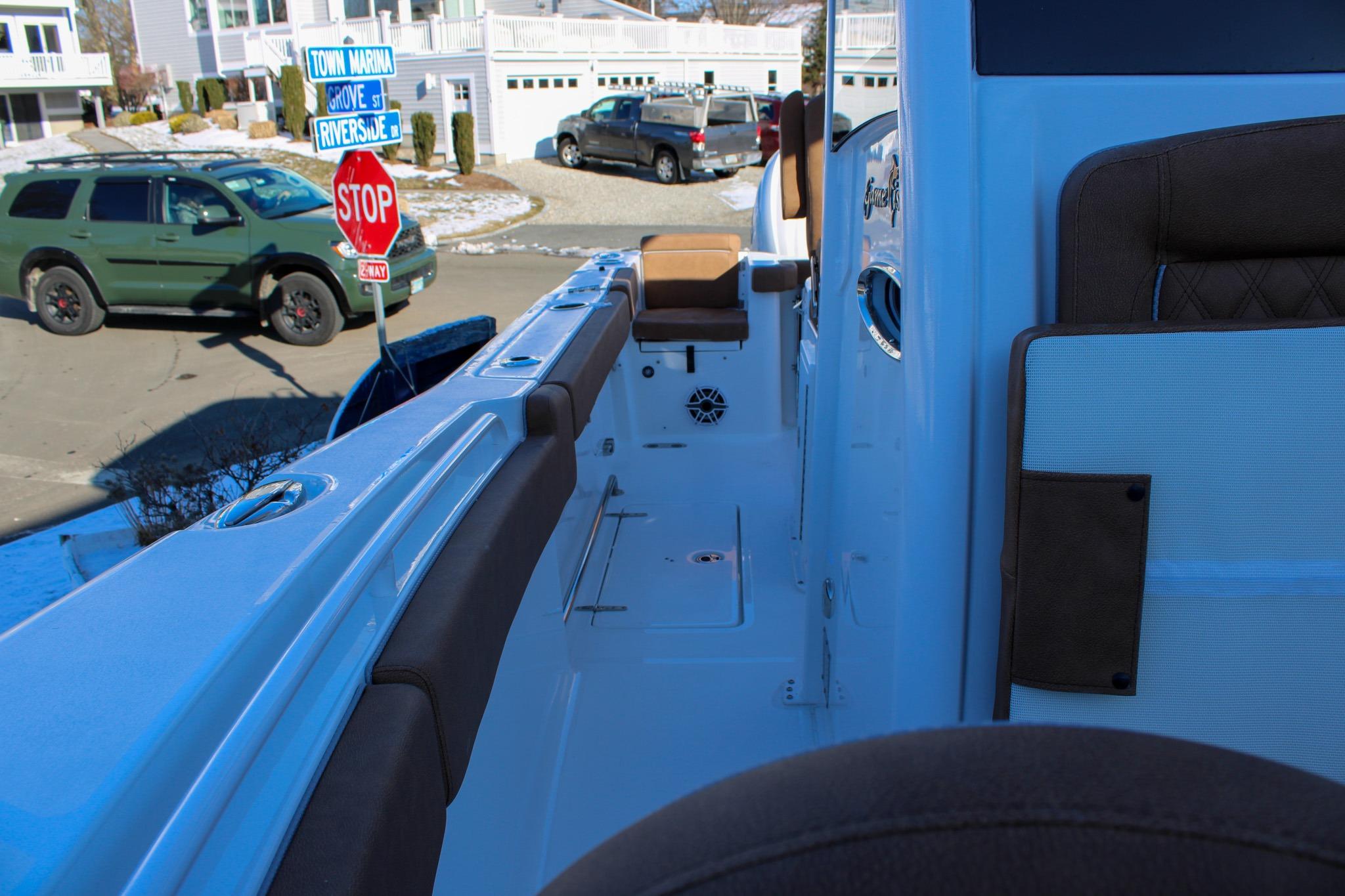2026 Sea Hunt Gamefish 25 boat interior with seating and street view.