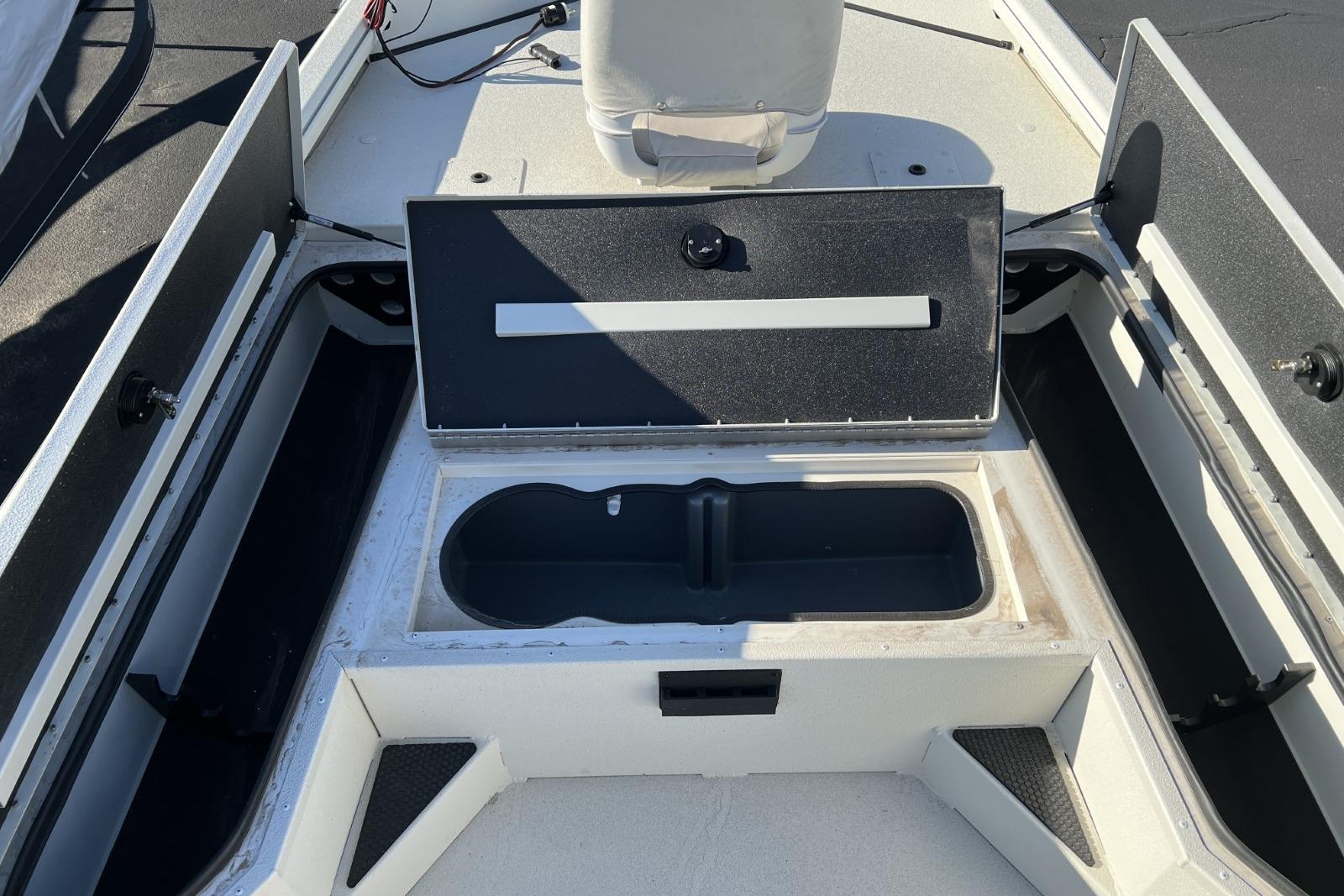 2024 Ranger RB200 boat interior with open storage compartments and seating.