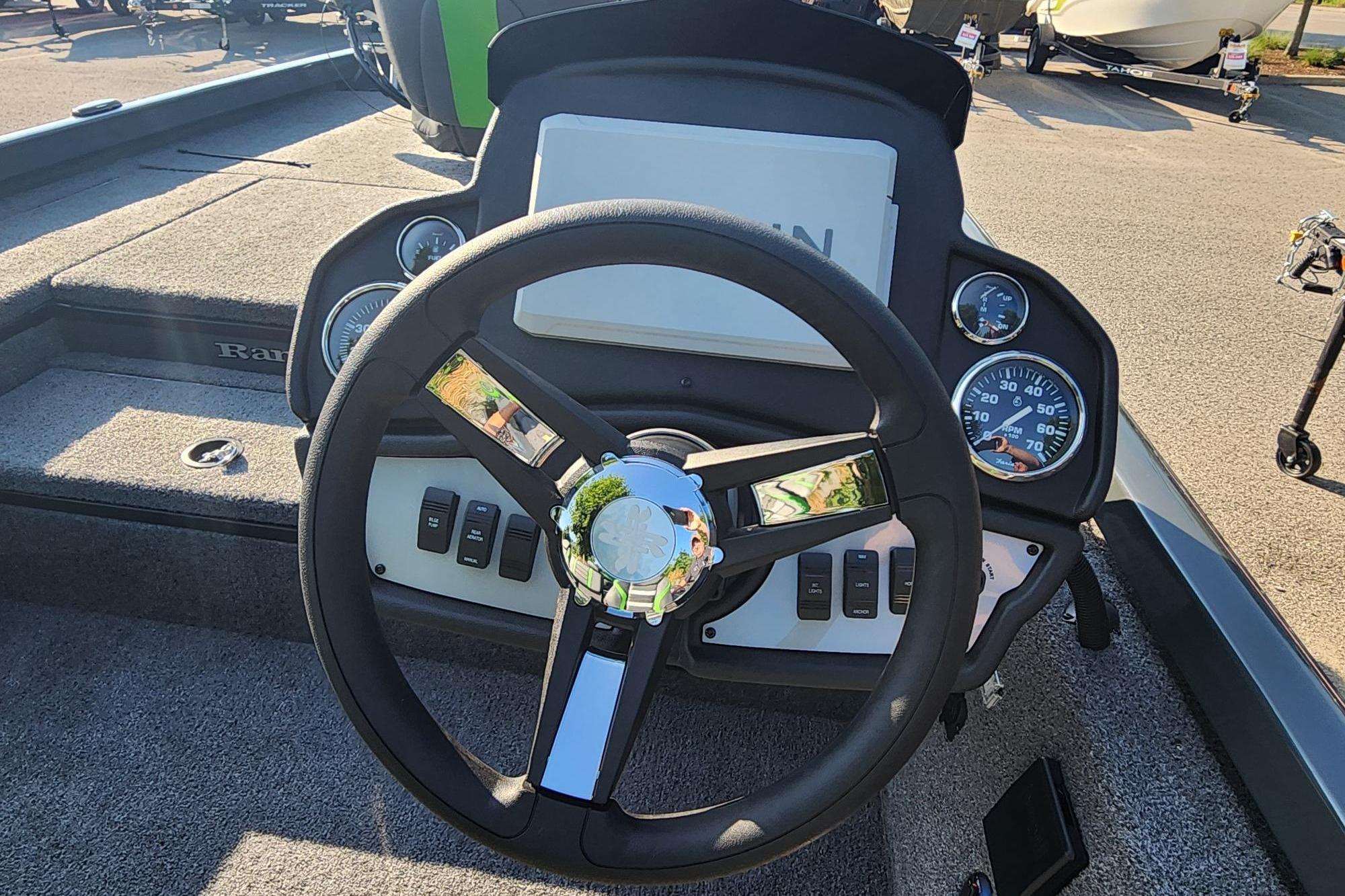 Steering console of 2026 Ranger RT178 boat with gauges and controls.