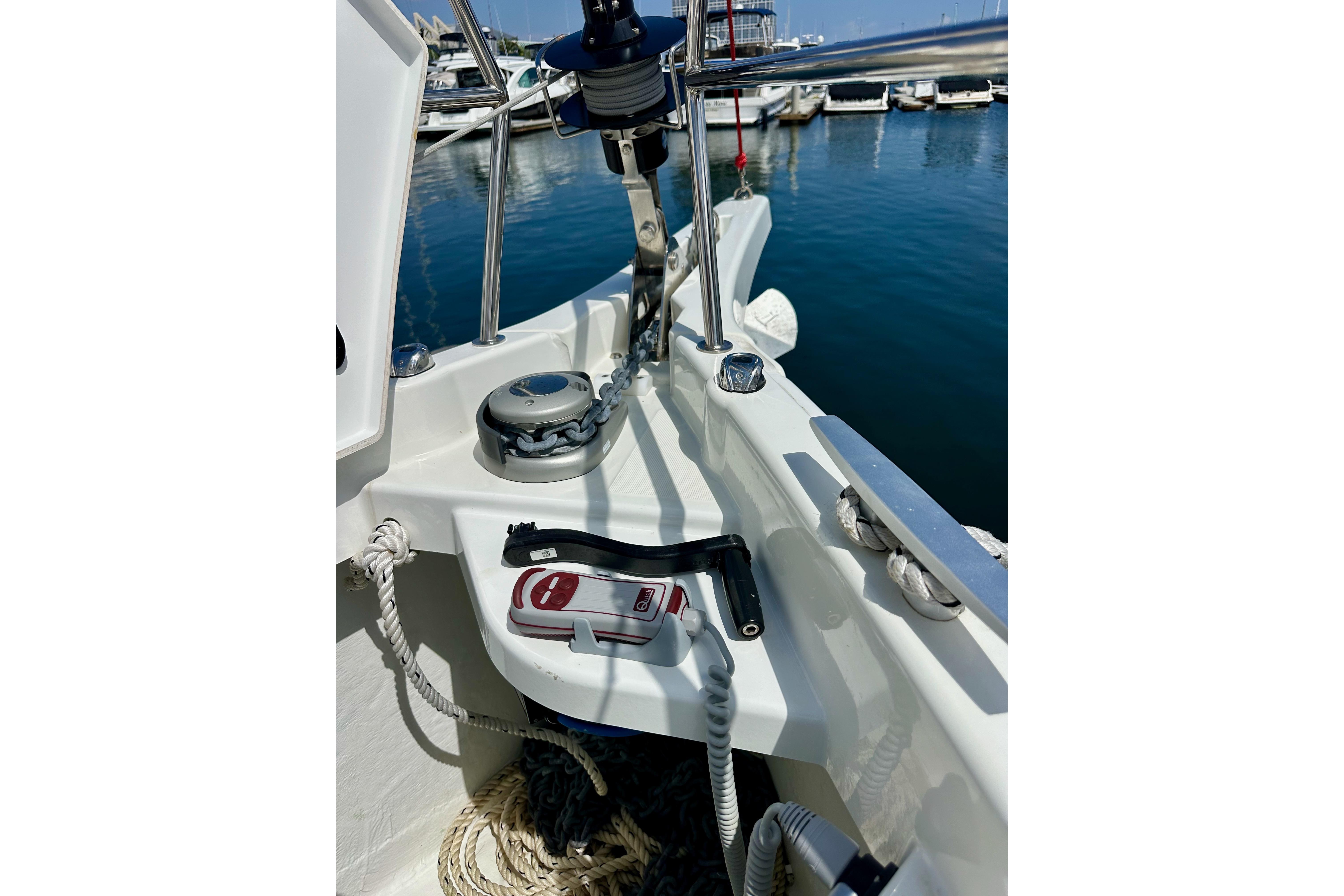 2024 Jeanneau Sun Odyssey 410 yacht deck with winch and ropes at marina.