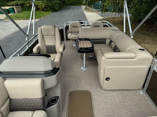 2025 Sun Tracker SportFish 22 XP3 pontoon boat with luxurious seating and modern design.