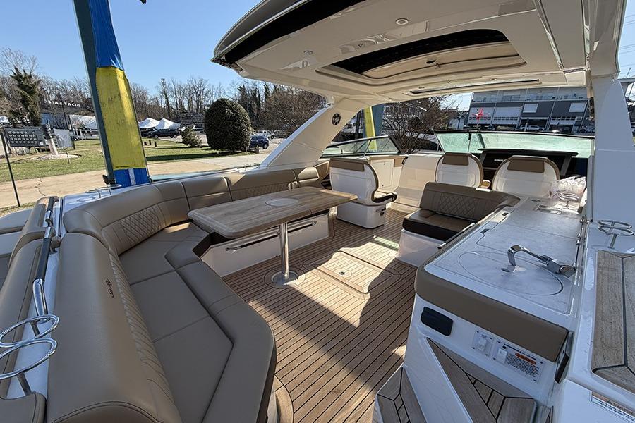 Luxurious 2023 Sea Ray SLX 400 yacht interior with spacious seating and elegant design.