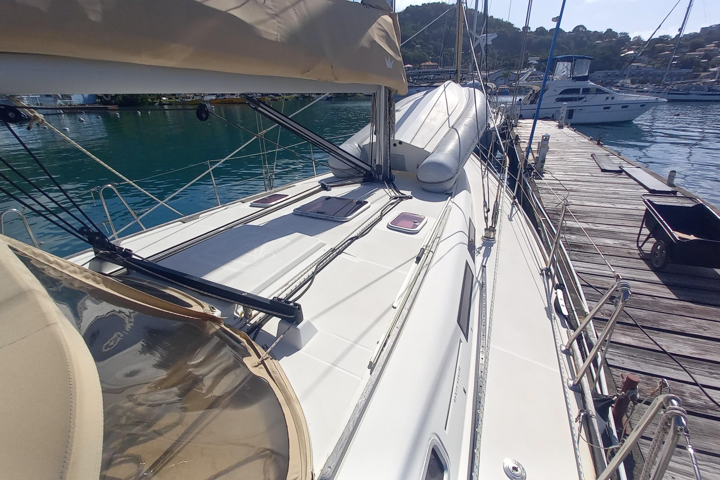 Sailboat Dufour 425 Grand Large 2011 docked at marina, sunny day.