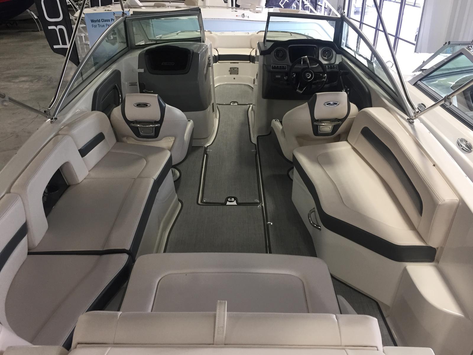 Interior of 2019 Chaparral 264 Sunesta with luxurious seating.