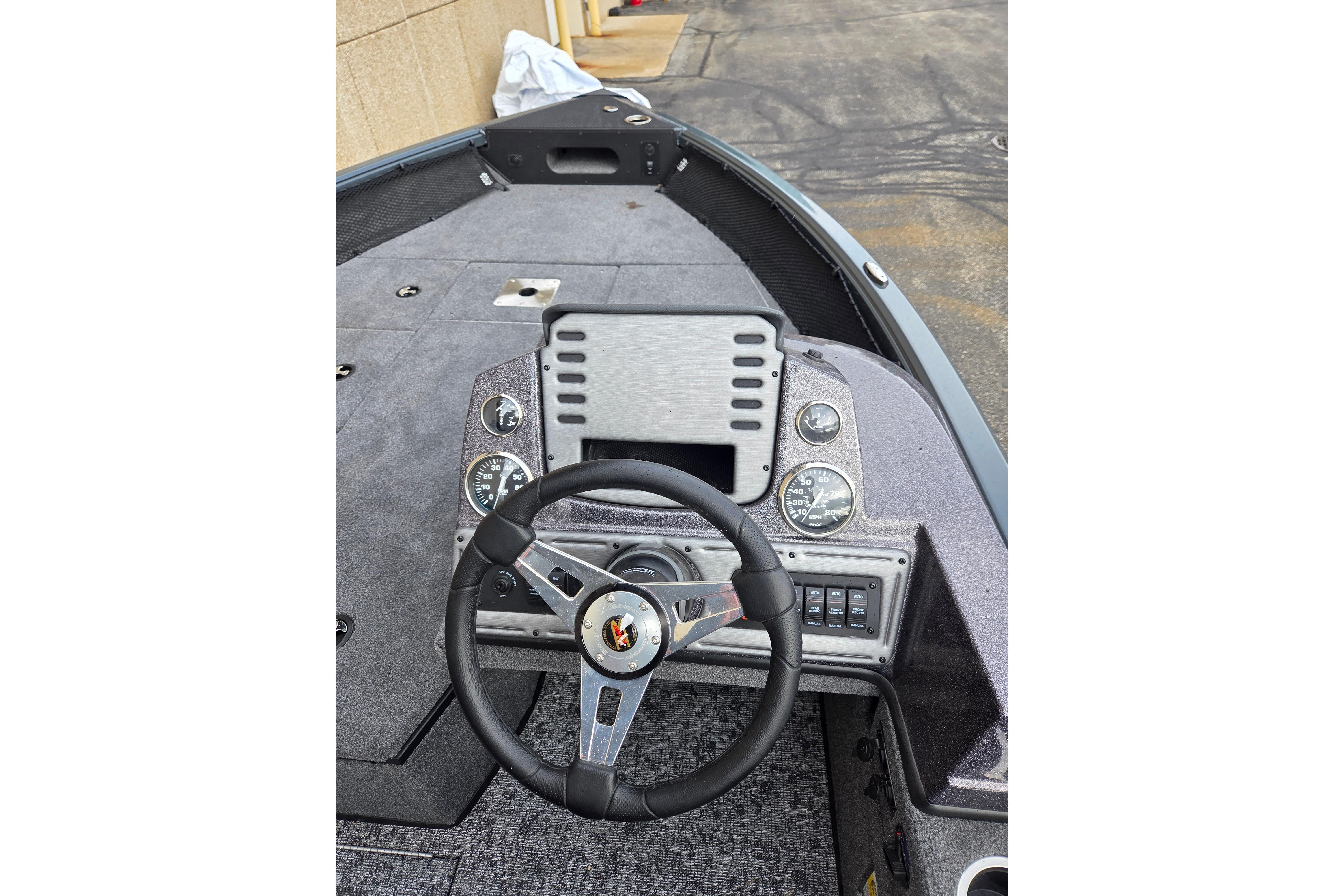 2025 Ranger VS1682SC Angler boat dashboard with steering wheel and instrument panel.